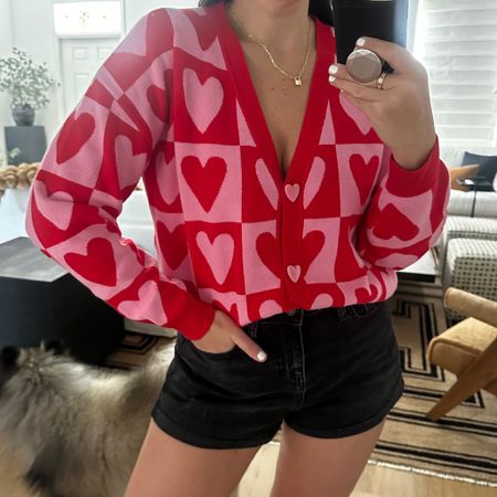 Women's Heart Postage Stamp Graphic Cardigan - Red wearing size medium. Women's High-Rise Curvy Rolled Cuff Denim Shorts - Wild Fable™ Black Wash 6
