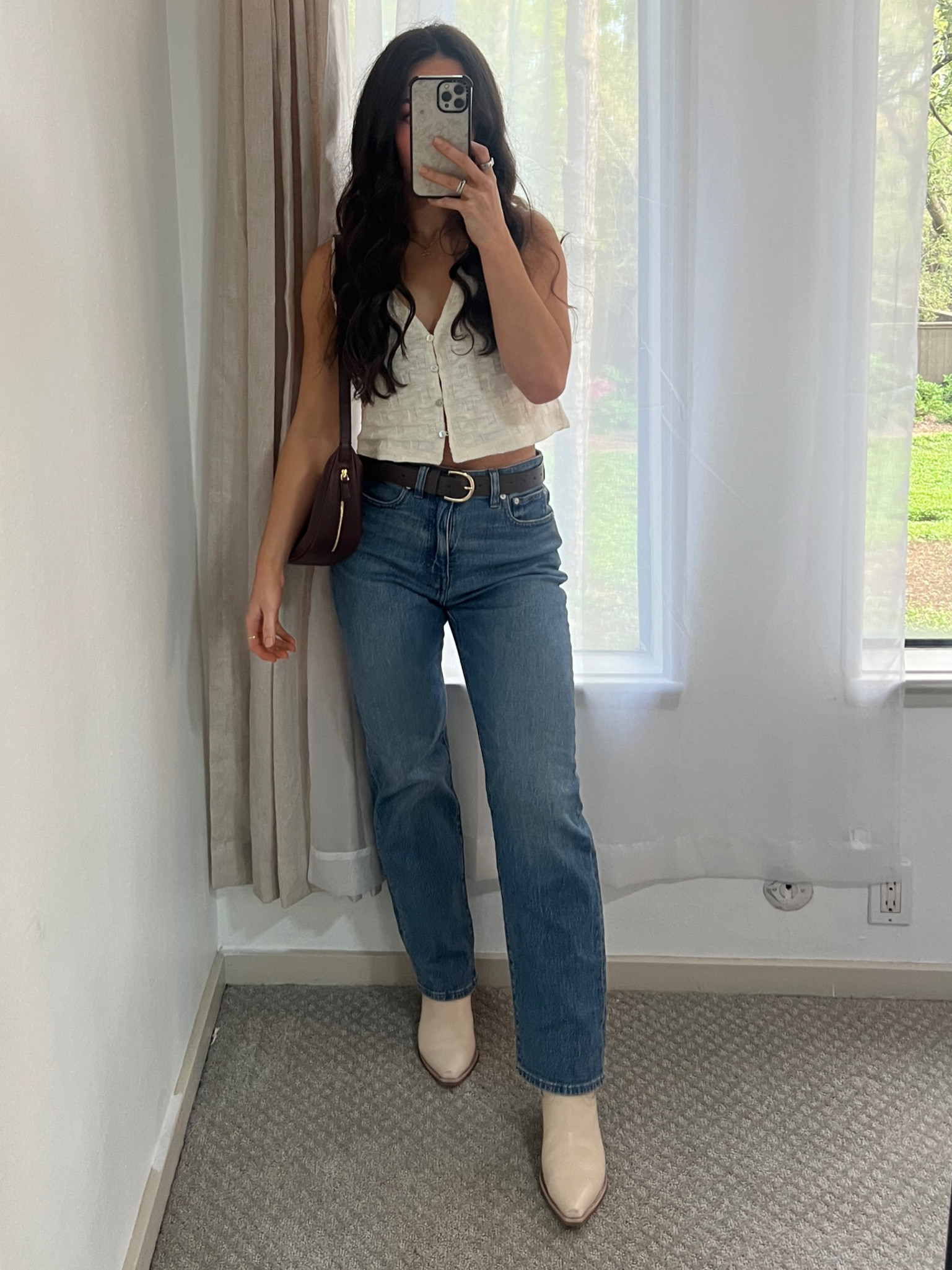 rodeo inspired ootn for a wine tasting event 🍷 loving this vest & these jeans & purse gifted from Madewell! wearing a 27 in the jeans and I’m typically between a 4/6. Really love Madewells curve line for jeans! I’ve had these boots for years and they’re pricey but have held up SO well through lots of country festivals & rodeo visits lol. You can get 20% off these boots (20% off orders of $100+) when you shop through the LTK app on Anthropologie through tomorrow, the 11th  (I linked the boots here) - such a great deal because these boots never go on sale! 

#LTKfindsunder100 #LTKshoecrush #LTKSpringSale