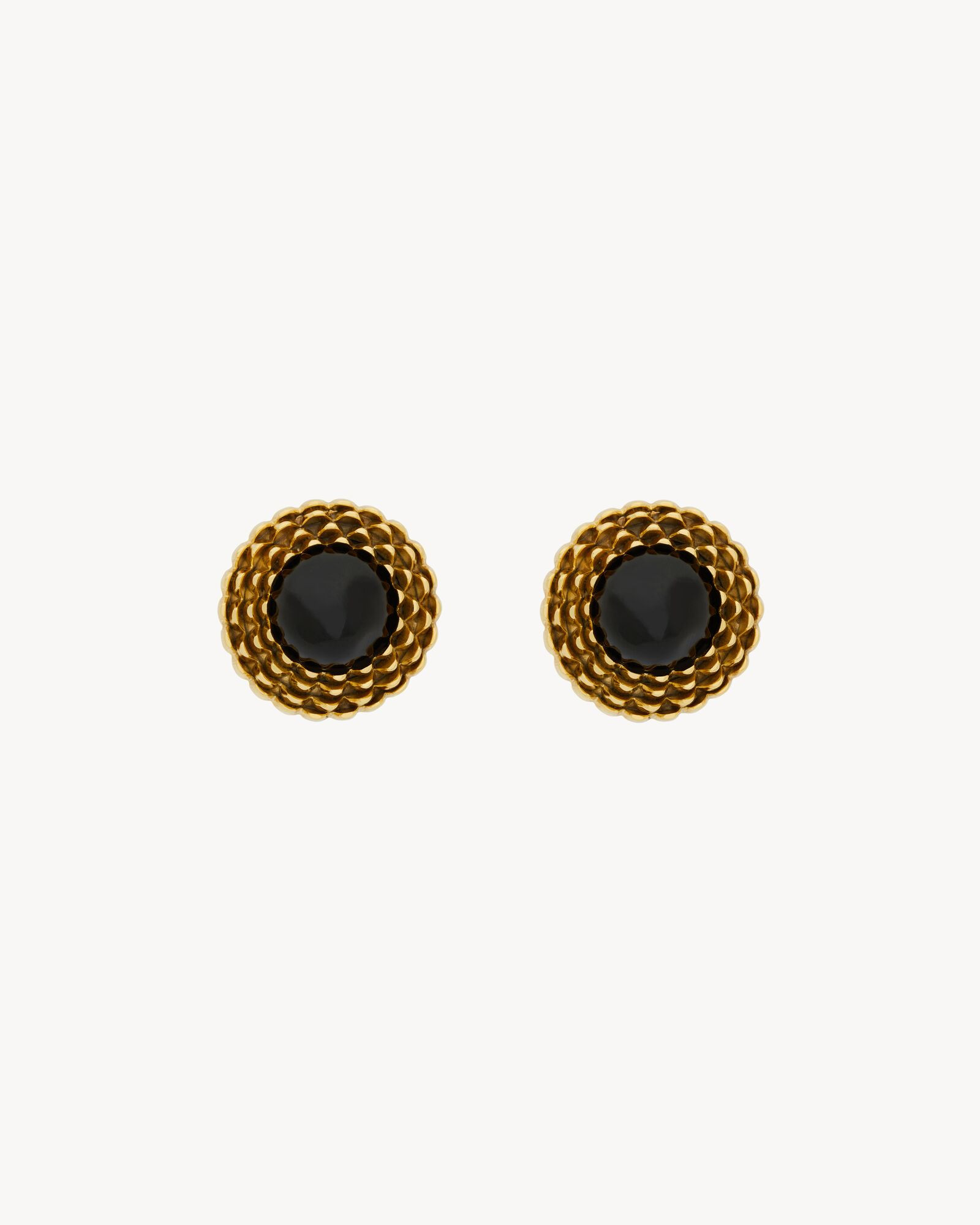 large round cabochon earrings with a scalloped petal halo in a vintage treatment. | Saint Laurent Inc. (Global)