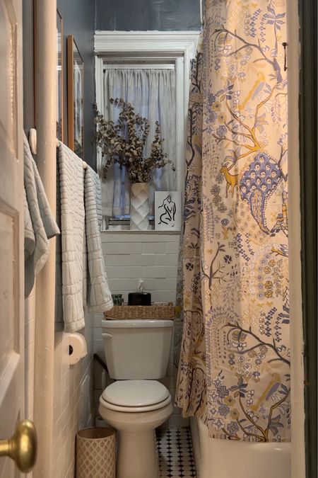 Bathroom products from Anthropologie- towel, bath mat, shower curtain, bath caddy, soap dispenser, towel hook and bar 

#LTKhome #LTKstyletip