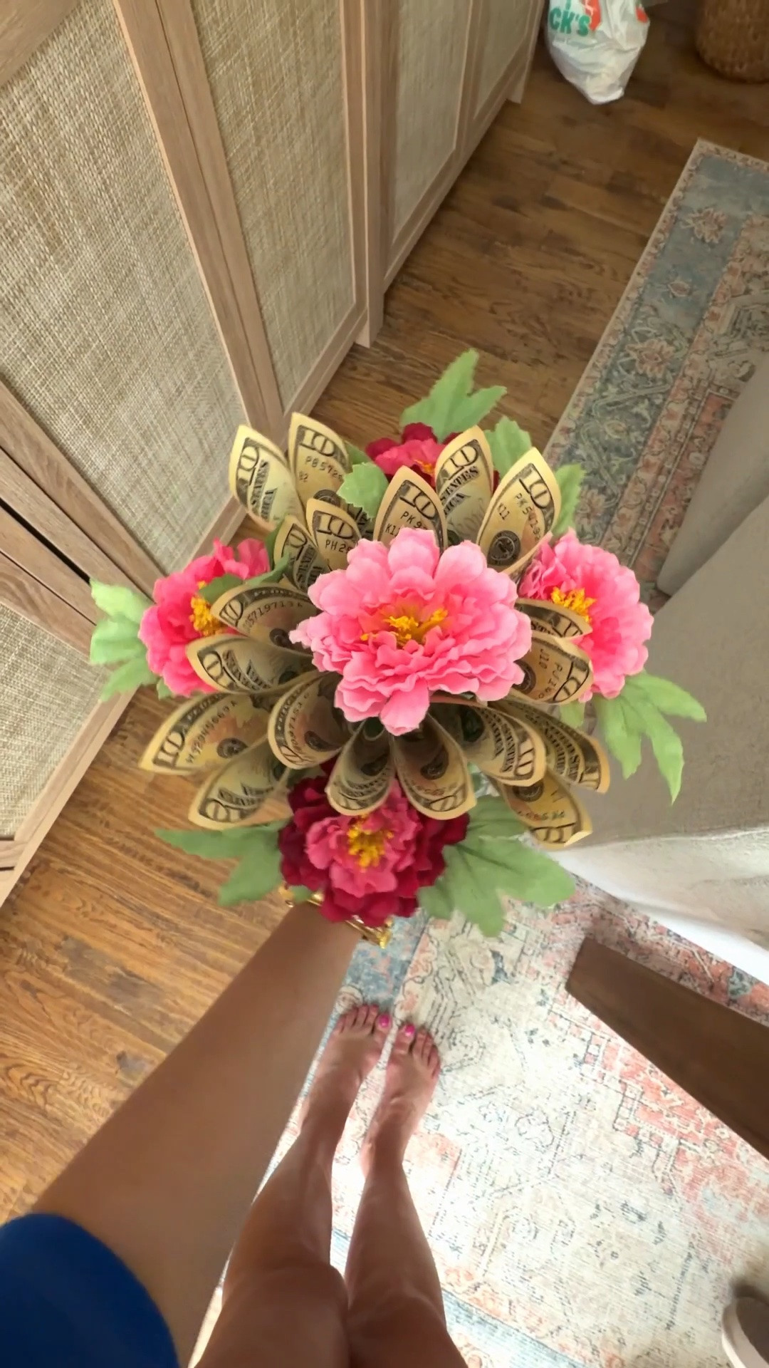 Money bouquet! 
For this one I used 10 bills.
Tape each bill to the skewer (size linked here)
Fold in the corners and tape to create "petals"
I used 6 petals to make a central flower, placing a rubber band around the sticks.
I filled in the rest of the vase with faux flowers (linked here) and the other 4 petals.
You can also use styrofoam to hold your skewers in place and wrap your bouquet with paper instead of using a vase!
.

#LTKdayinmylife #LTKmomlife #LTKSeasonal