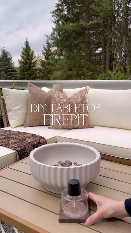 DIY Tabletop Firepit. Follow @farmtotablecreations on Instagram for more inspiration. I reused my fluted planter from #Walmart and turned it into a tabletop fire pit that also serves as a bug repellent. 🙌🏼 For reference two containers of rocks were used. Planter. Tabletop Firepit. DIY Home Decor. Patio Season. Patio Decor. Tiki Torch. Outdoor Space. Outdoor Sofa. Pillow Covers. Walmart Home Finds  

#LTKunder50 #LTKSeasonal #LTKhome
