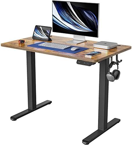 FEZIBO Height Adjustable Electric Standing Desk, 48 x 24 Inches Stand up Table, Sit Stand Home Of... | Amazon (US)