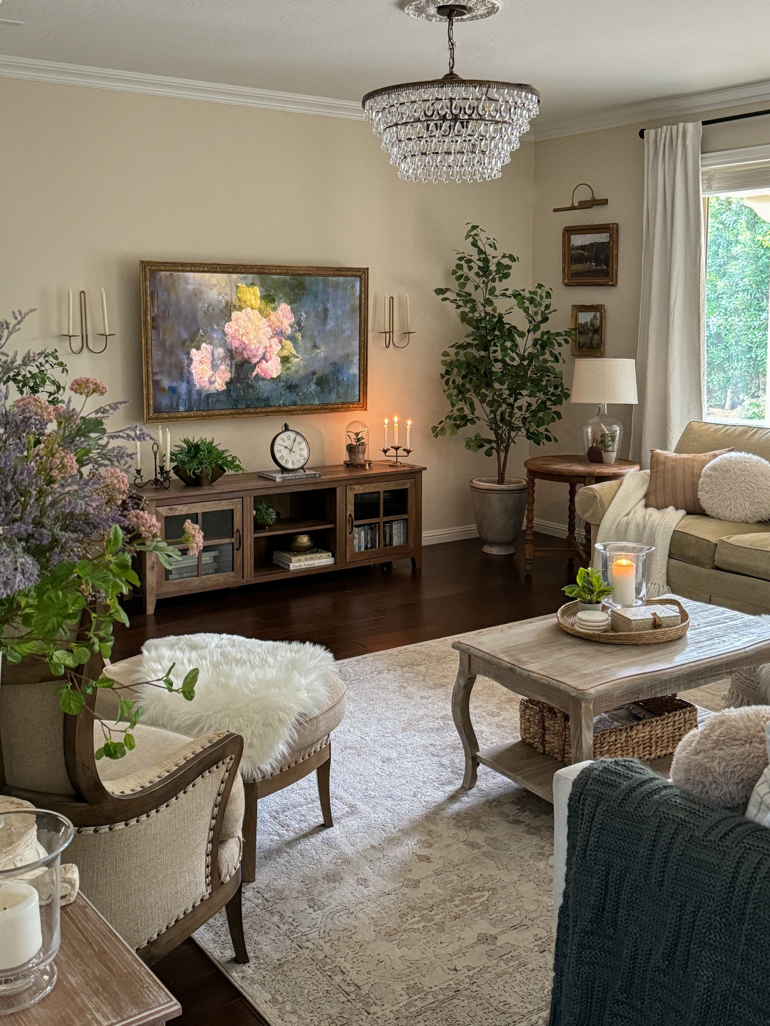 Cozy neutral, French country inspired  living room decorated for springg


Neutral living room, faux tree, French country coffee table, crystal chandelier, ceiling medallion, neutral rug

#LTKhome #LTKSeasonal