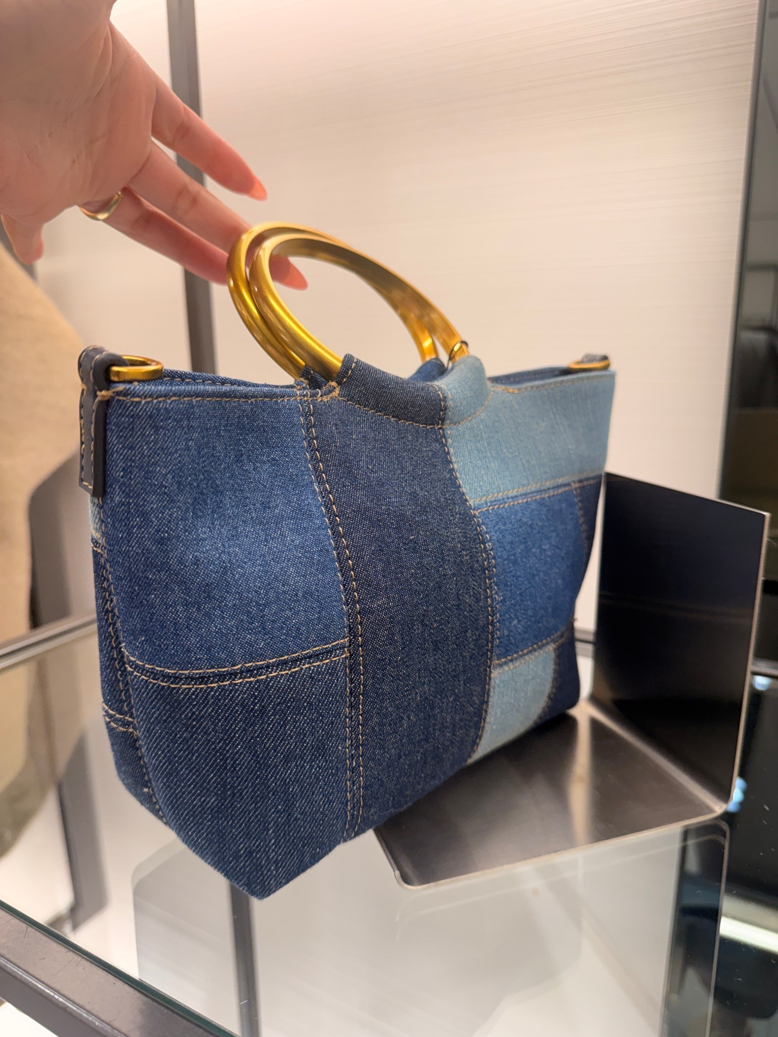 Patchwork denim mini bag with gold circle handles! Statement bag!  

#LTKootd