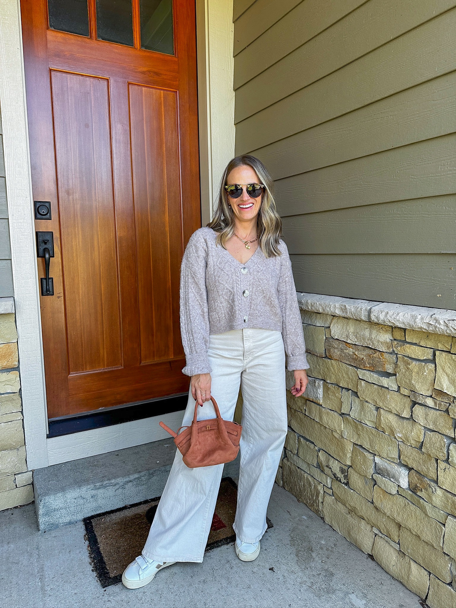 These $30 jeans from Target make the perfect fall outfit. My cropped sweater is under $70 and my sunglasses are from Amazon. #amazonfinds #falloutfit #under50 