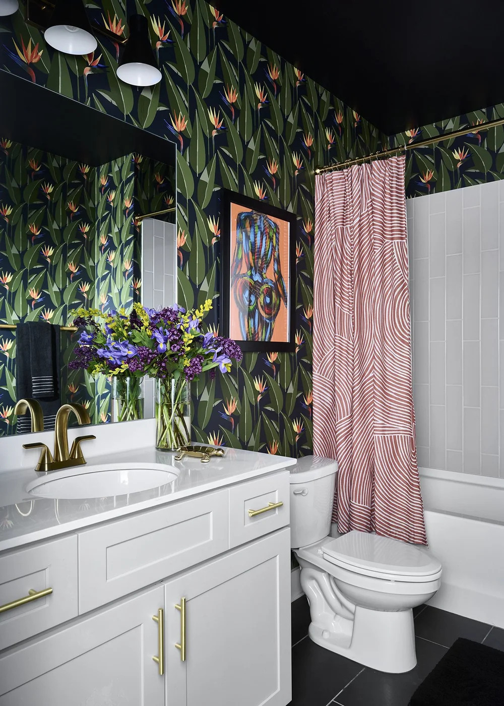 Bring bold pattern and personality into even the smallest spaces! 🌿

This powder bath from my Meet Me in Accra project proves that statement wallpaper + modern finishes can completely transform a room. Shop the look — from the tropical wallpaper and brass hardware to the chic vanity accents — all linked on my LTK 💚 🔗

Portfolio: blessedlittlebungalow.com/portfolio/meet-me-in-accra

#BlessedLittleBungalow #BLBDesign #MeetMeInAccra #WallpaperWednesday #PowderBathGoals #TropicalWallpaper #HomeDesign #ColorfulHome #InteriorDesignInspo #LTKDesign #WallpaperLover 

 #LTKHome