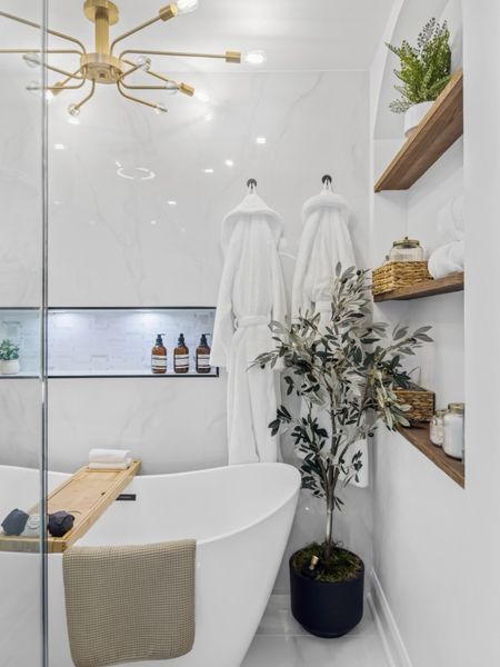 Modern luxe bathroom transformation! 

Would you considering creating a relaxing, at-home spa area in your master bathroom? 🛀 #interiordesign

#LTKsalealert #LTKhome