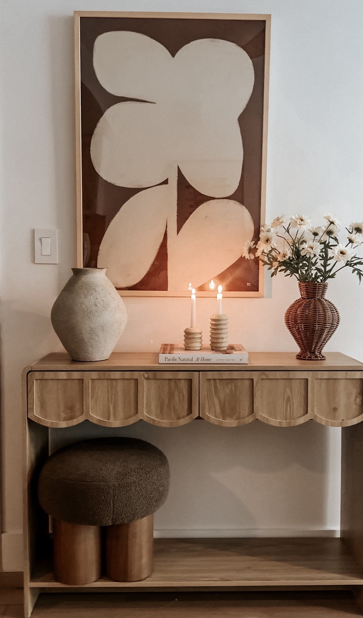 Affordable console table styling 🤎

Console table, vases, wall art, candle holders, ottoman, home decor, neutral home 

#LTKSeasonal #LTKHome