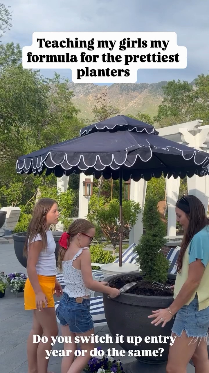 Teaching my girls my formula for the prettiest planters  Do you switch it up entry year or do the same?

Giant urn planters, scallop umbrellas, striped pool cushions and loungers.

#LTKSaleAlert #LTKHome