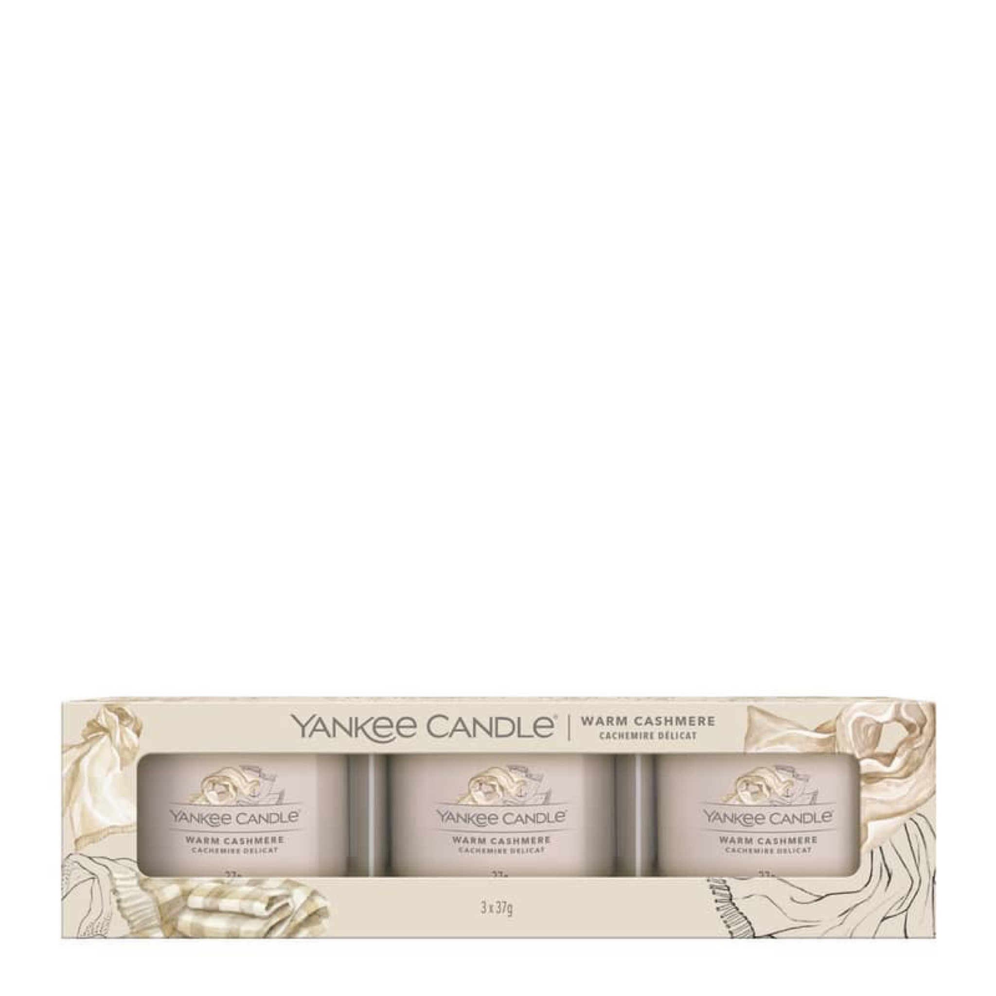 Yankee Candle in Cashmere
Wrap yourself in luxury with sumptuous notes of calming sandalwood and exotic patchouli.   Key features: - Yankee Candle® filled votives offer a modern and easy way to enjoy your favourite fragrances.  - Authentic ingredients and premium wax deliver clean, consistent, room-filling aroma.  - 100% natural fibre cotton wick straightened and centred for a clean, even burn.  - Soy blend wax mix with vibrant colour.  - Hand-illustrated fragrance imagery on label.  Top notes: Sun Kissed Orange.  Mid notes: Cashmere Wood, Golden Amber, Cardamom.  Base notes: Creamy Sandalwood, Sueded Musk, White Patchouli, French Vanilla.

#LTKhome #LTKGiftGuide #LTKfamily