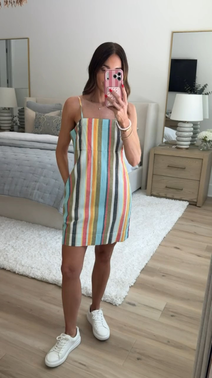 The colors on this dress are even prettier in person and make it so easy to style with white sneakers for daytime or sandals for dinner. The fabric has enough structure that it doesn’t cling, the adjustable straps help get the fit just right, and it’s one of those dresses that doesn’t need much accessorizing because the stripe pattern does all the work.

striped summer dress, colorful dress, linen blend dress, vacation dress, beach vacation outfit, casual summer style, resort wear, adjustable strap dress, colorful striped outfit, summer dress with sneakers, true to size, annabrstyle

#LTKootd #LTKTravel #LTKSeasonal