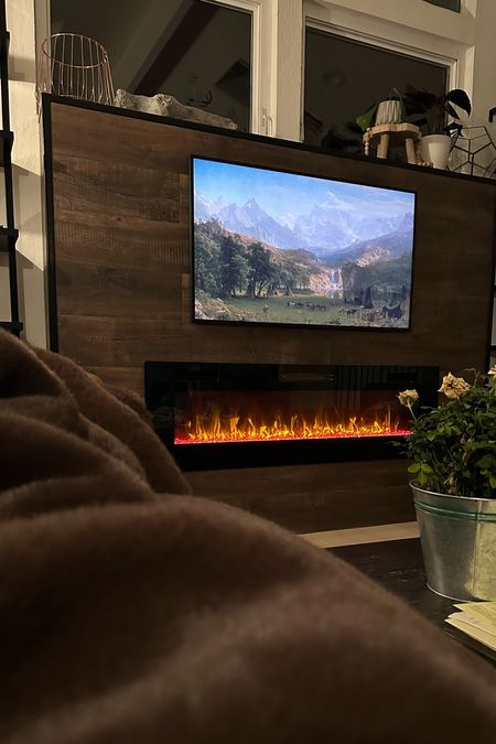 Samsung Frame TV + electric fireplace = best home update of the year!!!

#LTKfamily #LTKsalealert #LTKhome