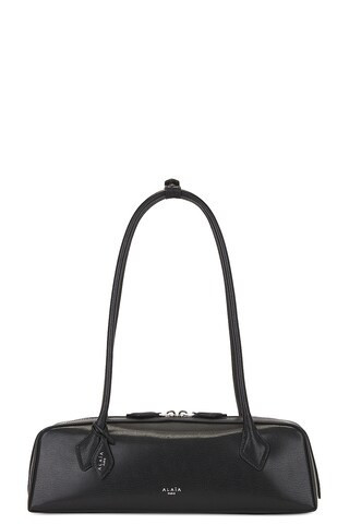 ALAÏA Medium Le Teckel Bag in Noir - Black. Size all. | FWRD 