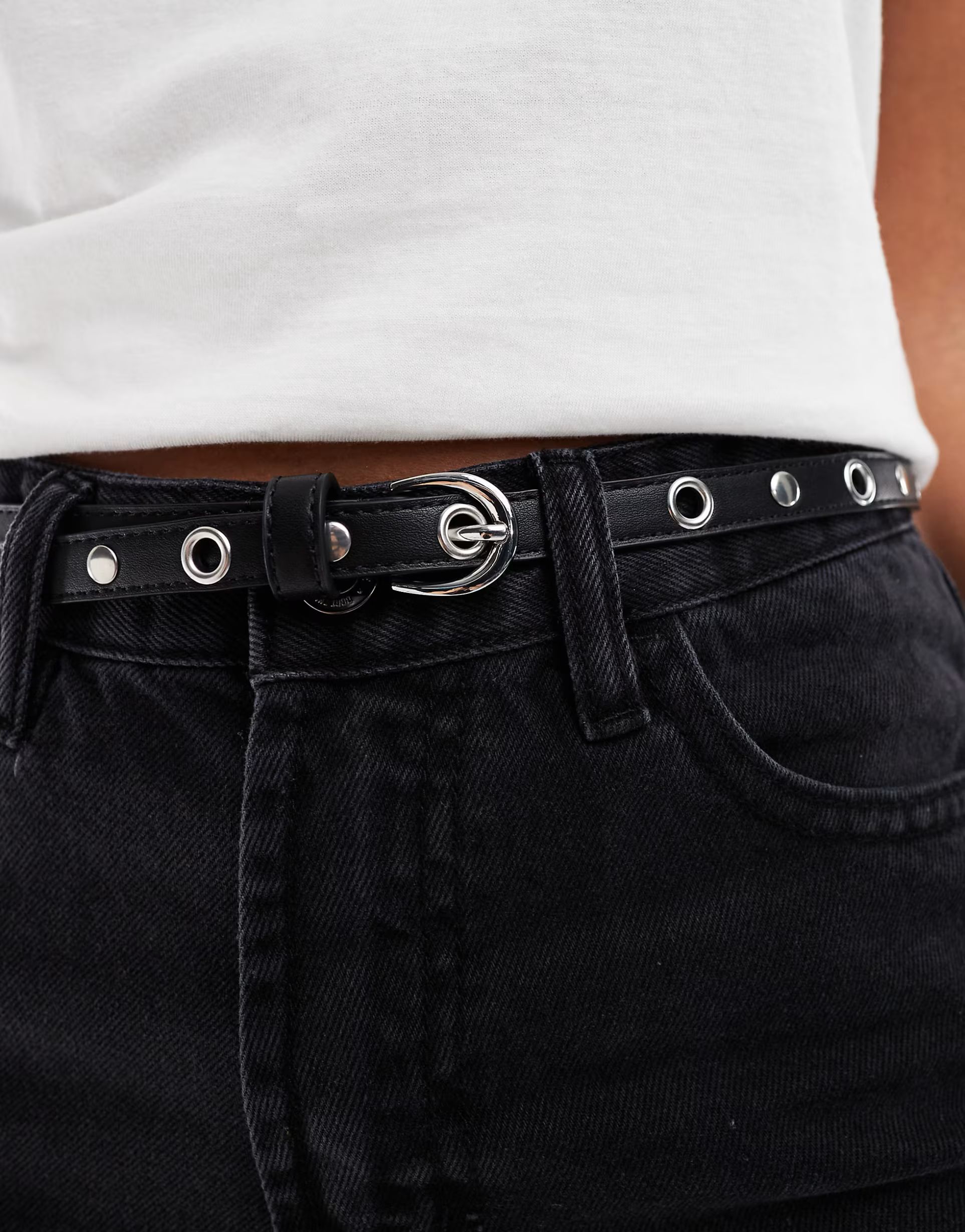 ASOS DESIGN eyelet skinny waist and hip belt in black | ASOS (Global)