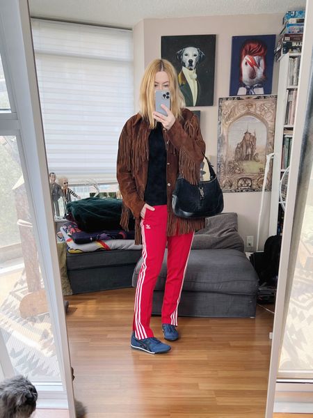 Some days my style adjectives come out much stronger than other days like today with it’s far lean away from minimalism. 
Classic - the black cashmere sweater and vintage Gucci Jackie bag
Casual - track pants and sneakers 
Unexpected - a vintage fringe jacket. Maybe even the red is a bit unexpected.

These are the $10 Poshmark find pants. The jacket and bag are vintage.

•
.  #StyleOver40  #adidas  #onitsukatiger #vintagegucci  #thriftFind  #thriftfind #secondhandFind #etsyfind #poshmarkfind #FashionOver40  #MumStyle #genX #genXStyle #torontostylist #shopSecondhand #genXInfluencer #WhoWhatWearing #genXblogger #secondhandDesigner #Over40Style #40PlusStyle #Stylish40s #styleTip  #StyleIdeas


#LTKFind #LTKshoecrush #LTKstyletip