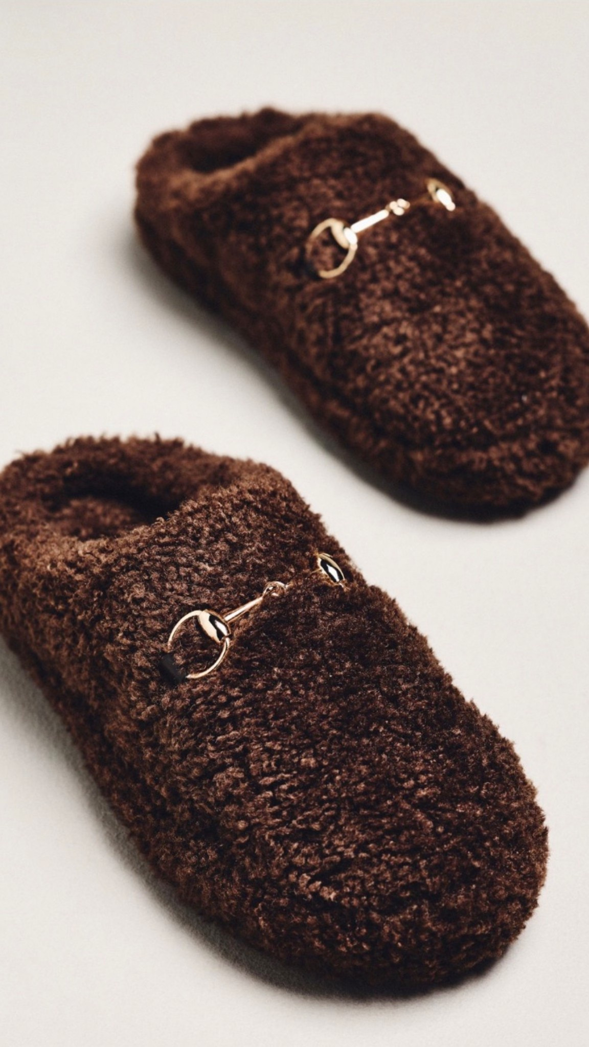 Cute fuzzy slippers with horse bit Gucci vibes. Make a great gift idea! 

#LTKSeasonal #LTKmomlife #LTKGiftGuide