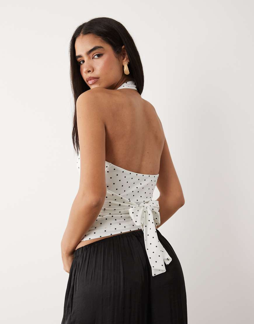 Gina Tricot halter neck tie detail top in black and white polka dots | ASOS (Global)