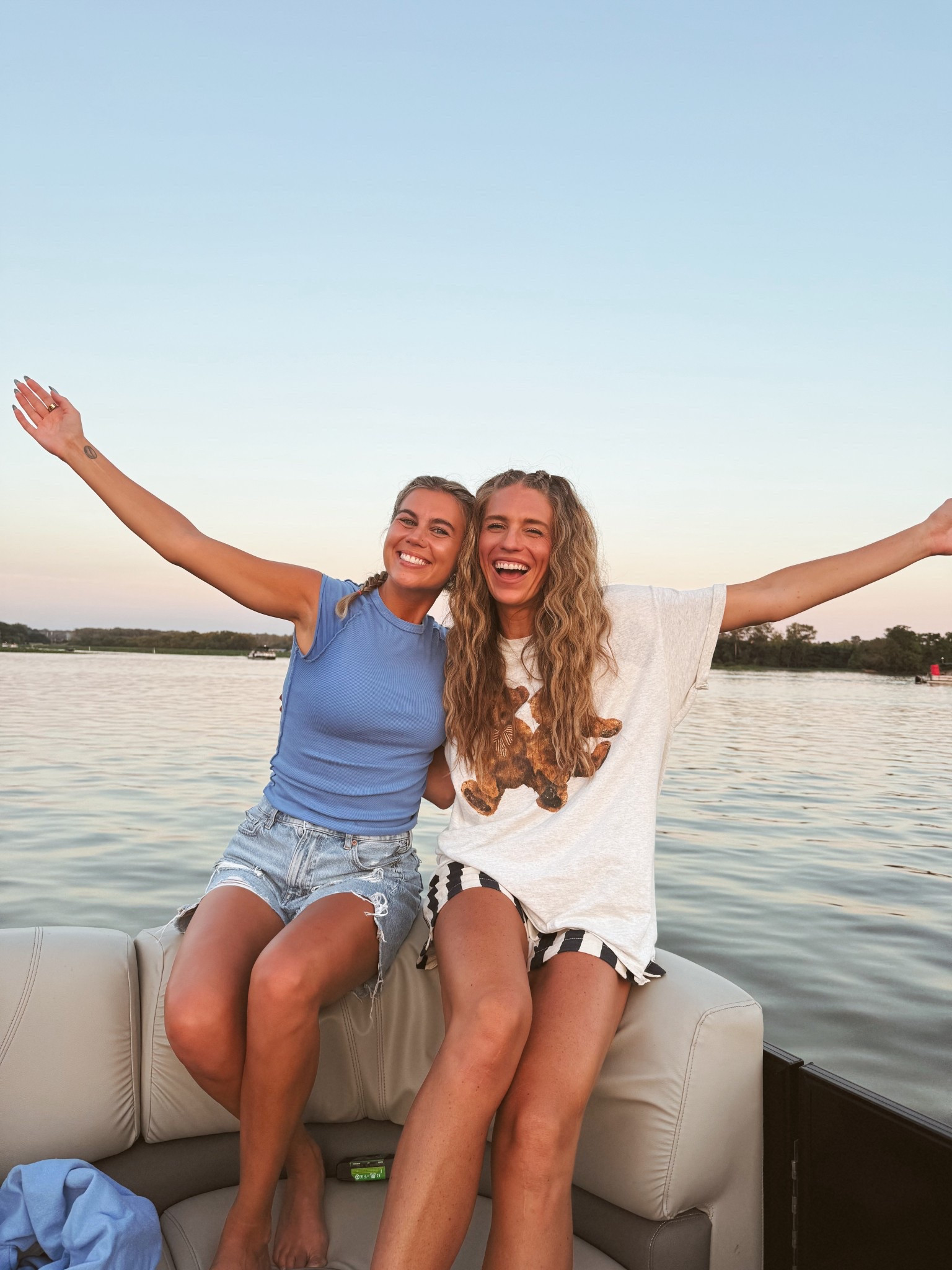 My July 4th outfit on the lake to watch fireworks! Size medium in the teddy bear tee (runs oversized) and  my usual medium in the striped shorts (run slightly oversized) 

Also linked my hair waver. It’s the 1.25"