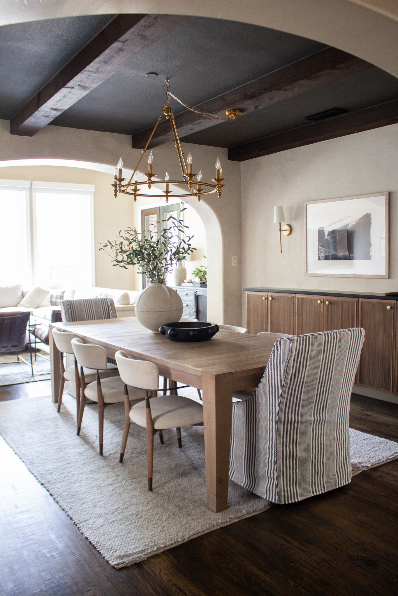 Warm wood tones + soft neutrals never miss. The dark beams, classic chandelier, and layered textures make this dining space feel timeless and inviting. I linked similar pieces to help you recreate this rustic-modern look.

dining room decor, wood dining table, brass chandelier, dark ceiling beams, neutral dining chairs, textured area rug, modern rustic home, warm neutral decor, Amazon home finds

#LTKHome #LTKSeasonal