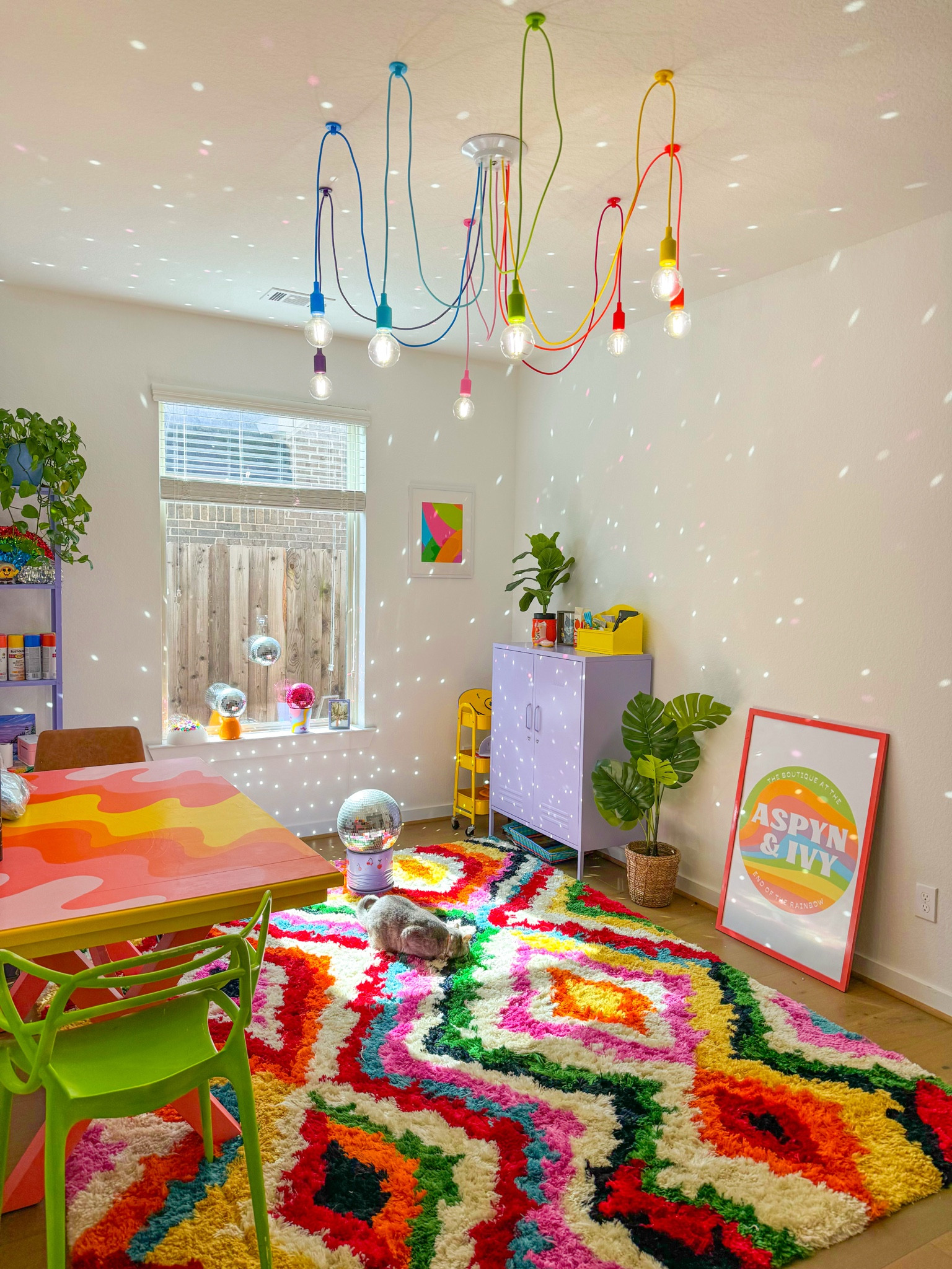 The rainbow office is my favorite place to be when the sun is out- the lighting is perfect!🤩🪩🌈 Plus, this fuzzy rug makes this area so cozy & COLORFUL!!✨💞