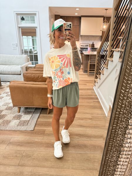 Graphic tees alllllll summer long⭐️✨🤎 obsessed w/ this floral print!!! In the large for an oversized fit! Mountain Moverz code HOLLEY25 to save 25% off this weekend! 🙌🏽 or code HOLLEY3 - but 2 get one 90% off! 

Casual style / outfit inspo / tees / trucker hats / comfy / Holley Gabrielle 

#LTKSaleAlert #LTKFindsUnder50 #LTKStyleTip