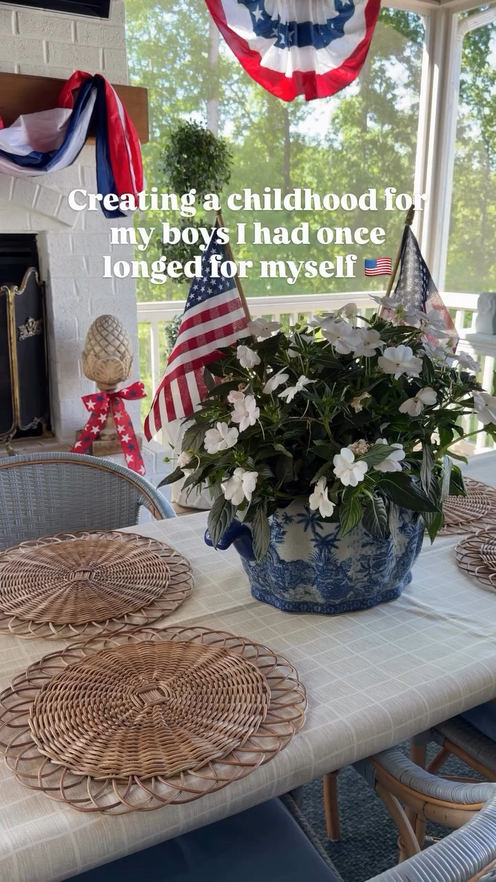Patriotic porch decor, but make it elevated 🇺🇸✨

I wanted this space to feel like Southern Americana meets European summer. Timeless, cozy, elegant, and family friendly enough to actually live in all season long.

Linked everything from this summer porch setup including:
• patriotic porch decor
• patriotic bunting
• outdoor American flags
• blue and white planter
• folding entertaining table
• french bistro style patio chairs
• woven placemats
• wipeable reusable tablecloth
• outdoor entertaining decor
• summer hosting essentials

Perfect for Memorial Day, Fourth of July, summer hosting, porch decorating, backyard dinners, and easy outdoor entertaining 🤍

Everything is linked in my LTK/Amazon storefront ✨

#LTKHome #LTKmomlife #LTKSeasonal