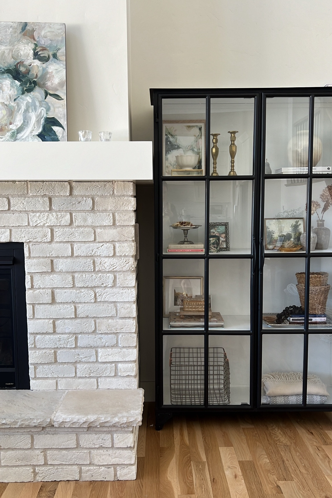 Love these black and white iron glass cabinets. Amber interiors and crate and barrel sell them.

#LTKHome
