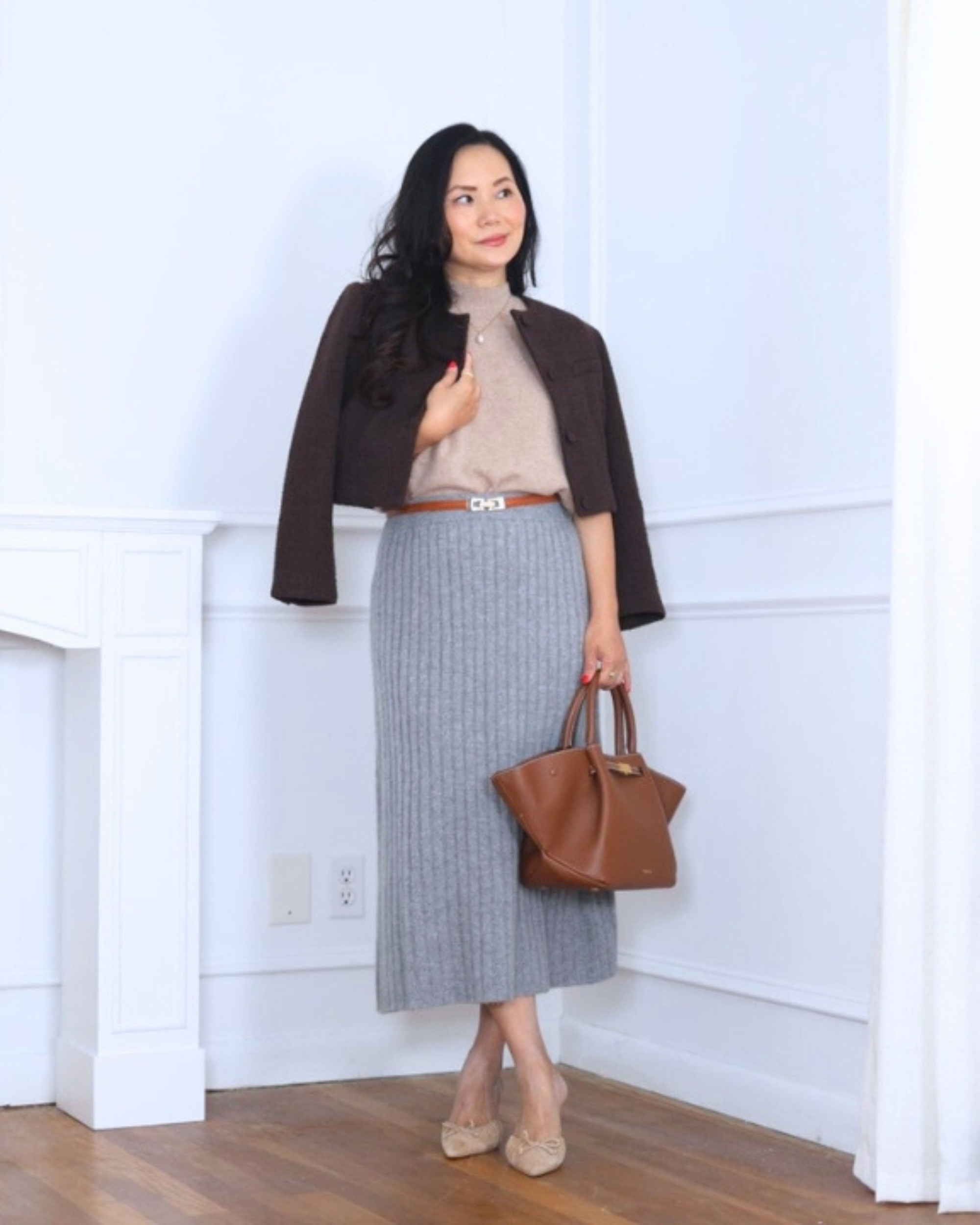 Feeling polished and cozy in a tweed jacket from Aritzia, paired with a mock neck top and a cashmere midi skirt from Quince — the perfect mix of texture and timeless style. I’m 5’2, wearing size S.

#LTKPetite #LTKOver40 #LTKStyleTip