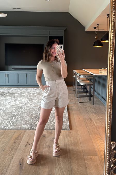 Wearing 26 in light beige tailored linen shorts, wearing small in taupe tee. This linen shorts are a bit dressier and would look amazing as a vacay look with wedges (would swap with a dressier tank/top).

#LTKsalealert #LTKSpringSale #LTKfindsunder50 
