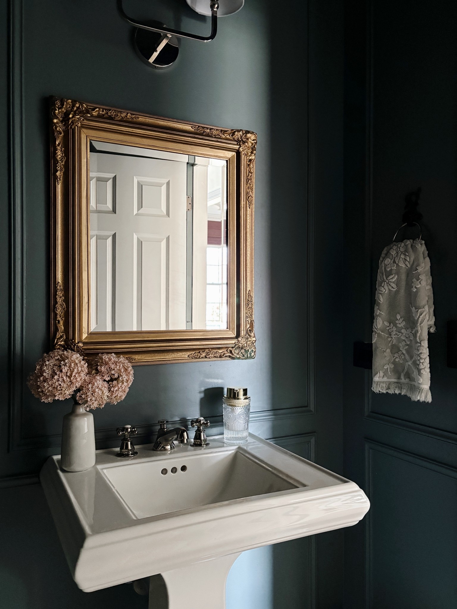 Spring powder room. Pedestal sink. Polished nickel faucet. 

#LTKSeasonal #LTKHome #LTKStyleTip