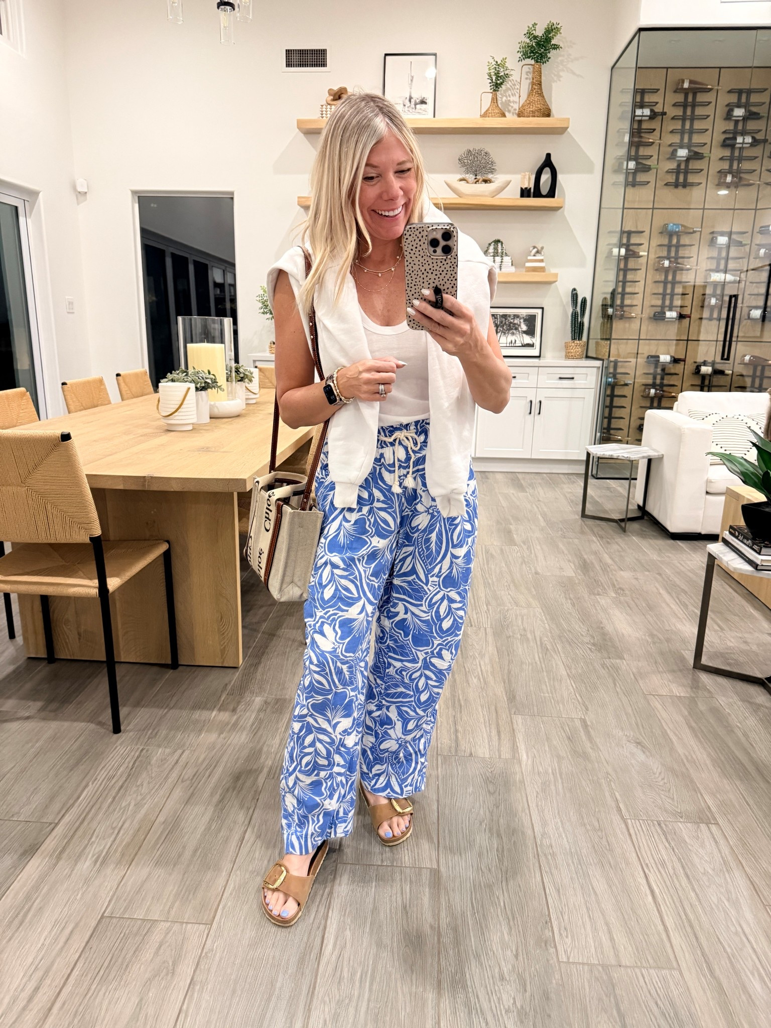 XS printed beach pants and small white tank top. Birkenstock run true to size. Beach vacation travel outfit 

#LTKootd #LTKTravel