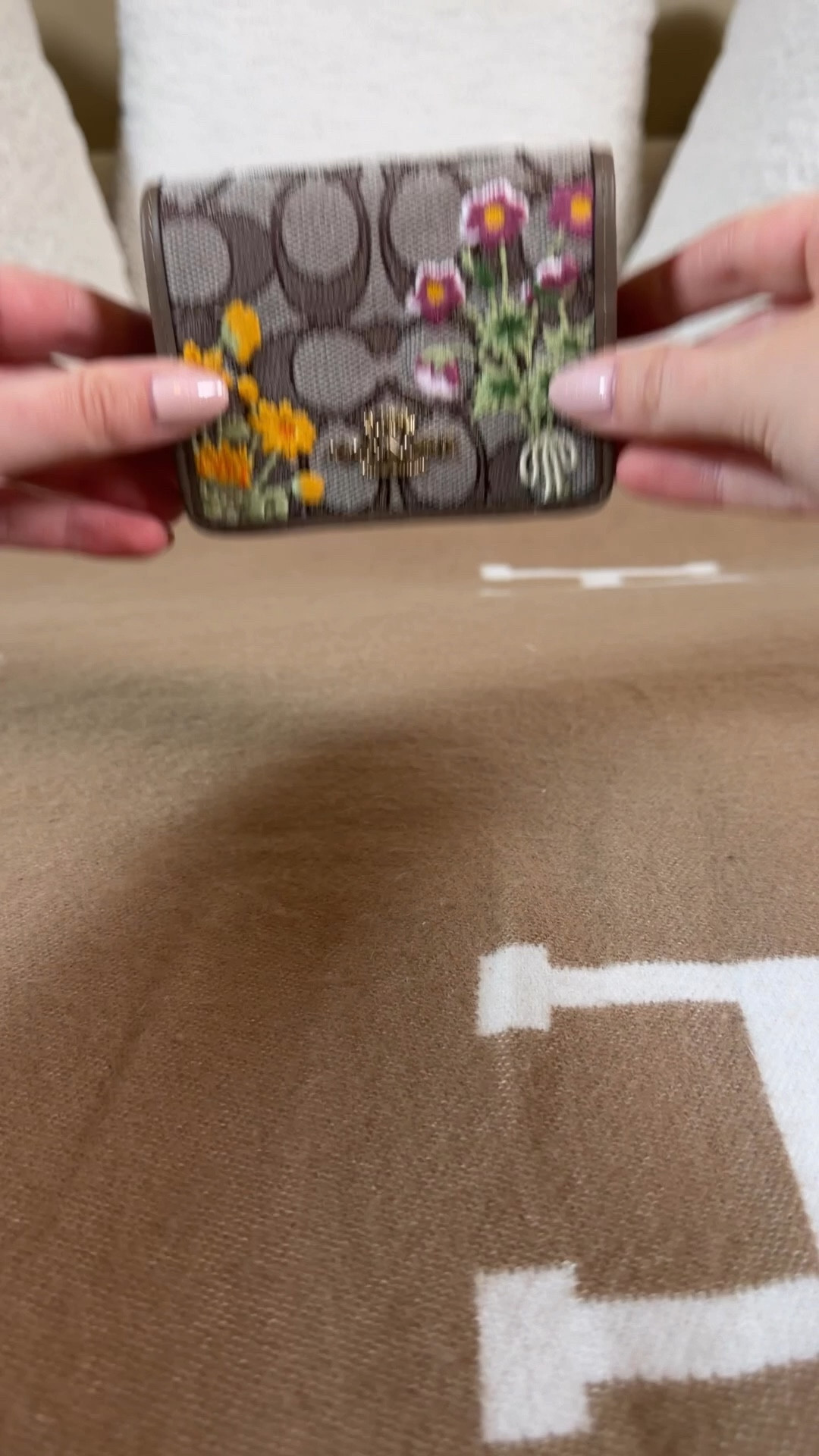 The perfect little wallet or mini going out bag for spring & summer 🌸 when I saw this mini wallet on a chain at the Coach outlet with the new embroidered flowers on the signature jacquard I knew she had to come home with me, and the sales associates told me they sell out all the time so I grabbed it so fast!
It comes with a chain but it’s detachable so you can add other chains and straps to make her fit your needs.
 I can’t wait to take her to Edinburgh next month when I get afternoon tea 🌸☕️🫖 she the perfect mini bag for  tea in the garden and can double as the prettiest wallet too. 

#LTKootd #LTKgrwm #LTKdayinmylife