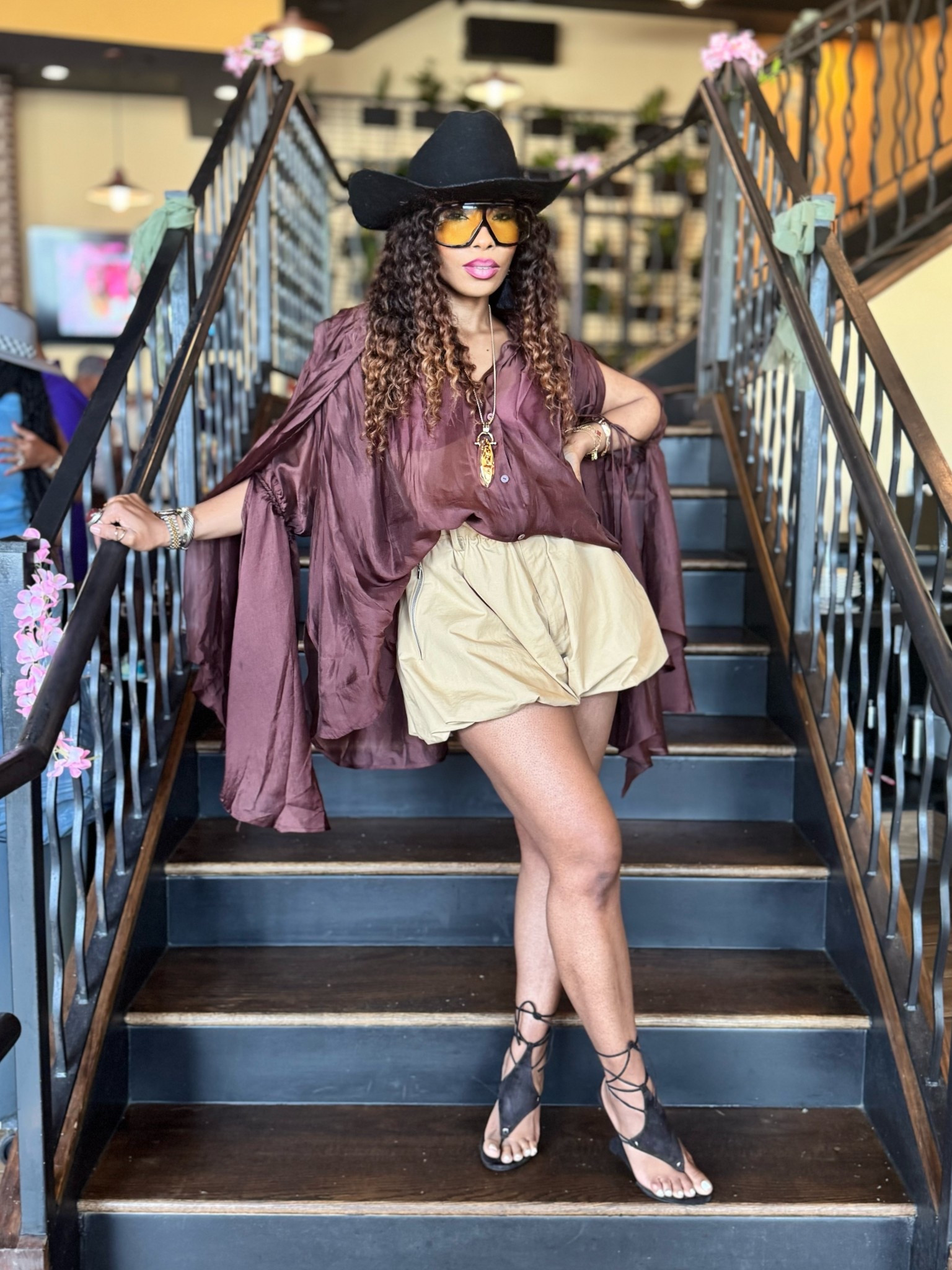 I’m a little bit country. I’m a little bit rock & roll! 

There’s something so magical about mixing Western and Boho Chic.
It’s the perfect juxtaposition — rugged meets romantic. Structured leather, denim, and cowboy hat bring that grit, while flowy fabrics, fringe, and earthy tones soften the edge.

It’s intentional, but effortless. Feminine, but tough. The contrast is what makes the look feel intentional — like you didn’t try too hard, but every piece is doing something.

Style tip: Pair a suede fringe jacket with a flowy maxi skirt, or rock a vintage belt and boots with a sheer blouse. Balance is the name of the game.

Would you wear this combo? Sound off below in the comments.

Outfit Details: 
Shorts: @zara 
Hat: @lackofcoloraus 
Sunnies: @tomford 
Sandals: @jeffreycampbell 
Shirt: @urbanrevivo (Code: THAIBARKER for 15% off)


#styleinspo #styletips #streetstyle #everydayoutfits #WesternBoho #CoolGirlStyle #BohoChic #WesternAesthetic #StyleJuxtaposition #summeroutfitideas  #summeroutfits 

#LTKFindsUnder100 #LTKStyleTip #LTKFindsUnder50