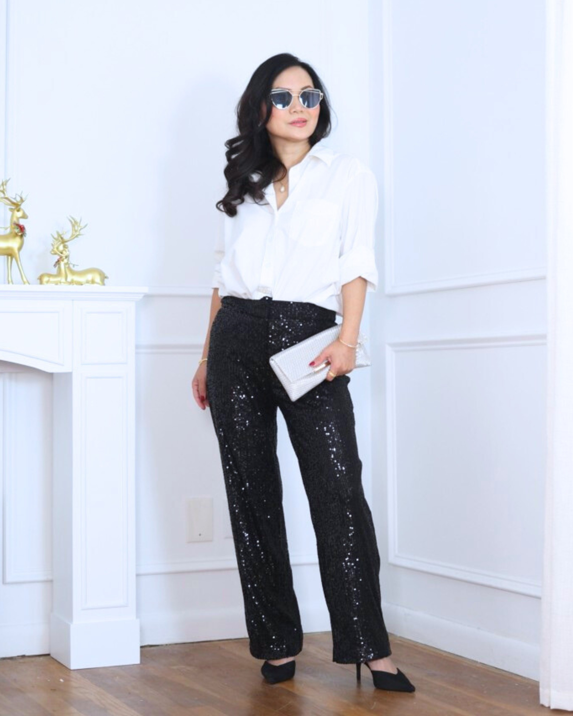 Black sequin pants and a crisp white button-up—simple on top, sparkle on the bottom. Finished with sleek H&M heels for a look that’s festive, effortless, and ready for any holiday moment. I’m 5’2, wearing size XS.

#LTKPetite #LTKOver40 #LTKHoliday