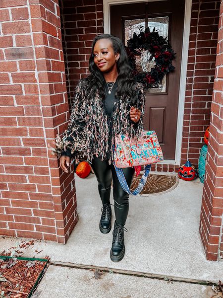 Platform Dr. Martens, leather leggings, shag cardigan, custom leather bag, & David Yurman jewelry. 

#LTKstyletip #LTKunder100 #LTKshoecrush