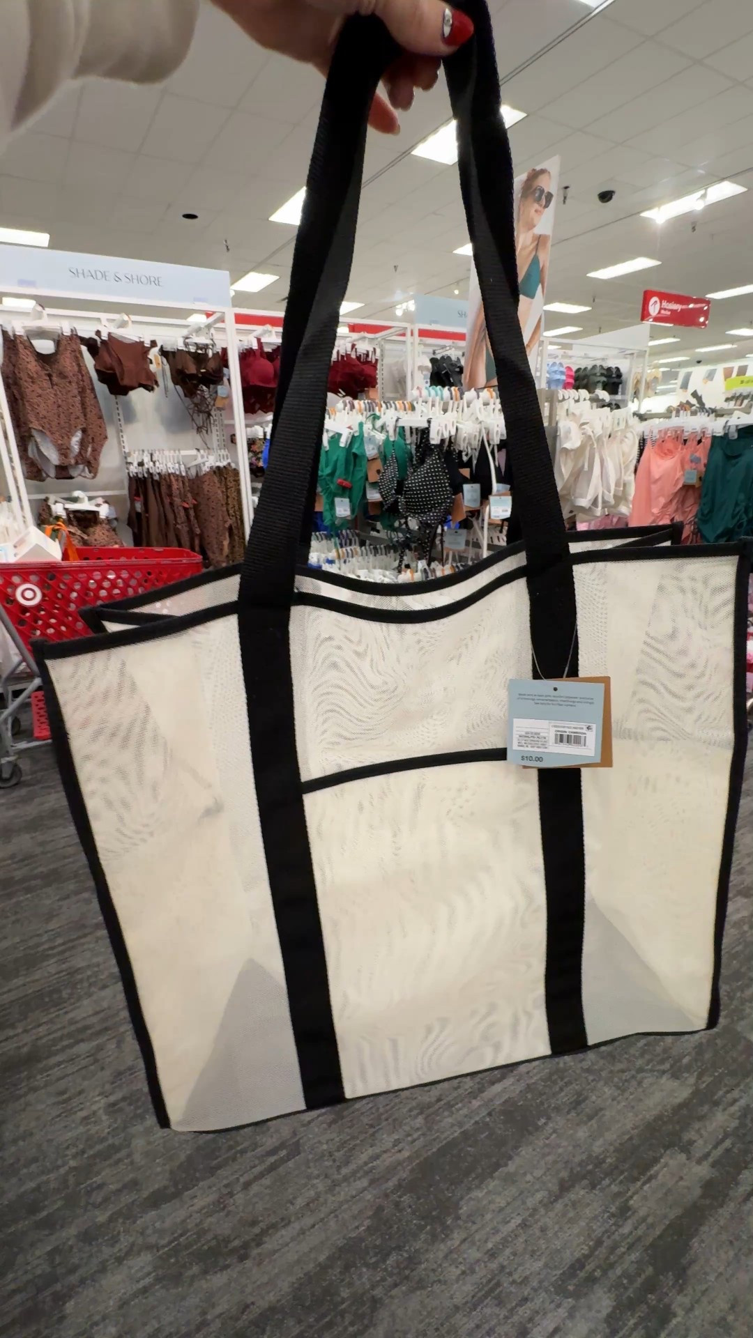 The $10 mesh beach tote!  It weighs nothing, packs in a suitcase perfectly, great for the pool or the beach  even better for beach toys!

Beach tote | pool bag | vacation tote | vacation outfit | target style | target finds | swim

#LTKItBag #LTKWatchNow #LTKSwim