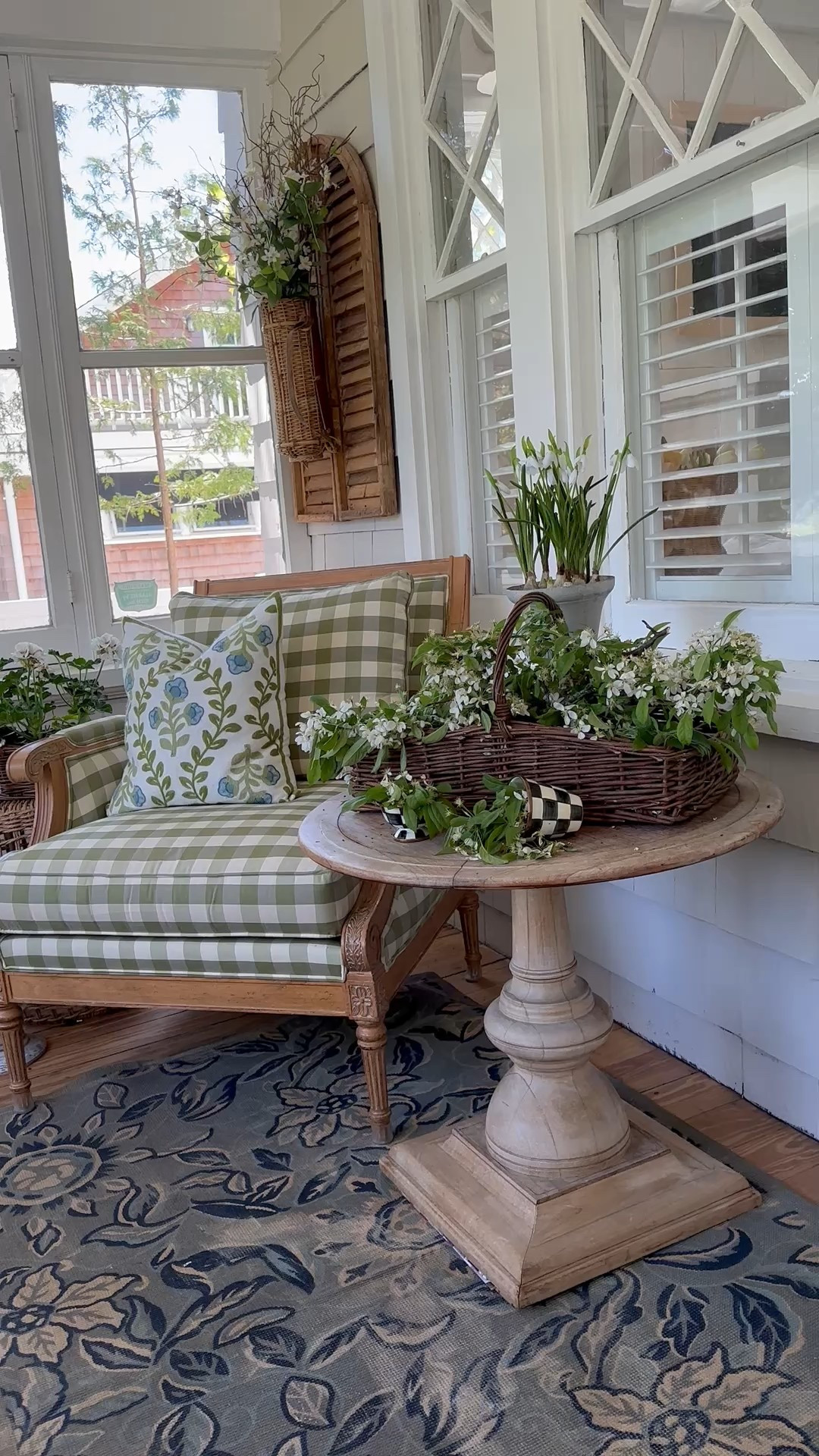 There’s nothing like a cottage spring with these baskets and cozy pillows and florals 