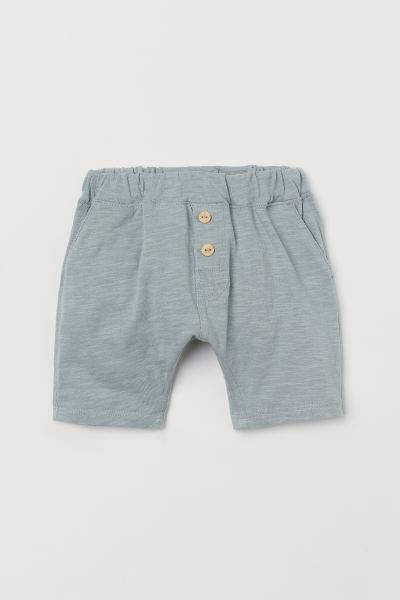 Baby Exclusive. Shorts in soft, organic slub cotton jersey with decorative buttons at front. Elas... | H&M (US)