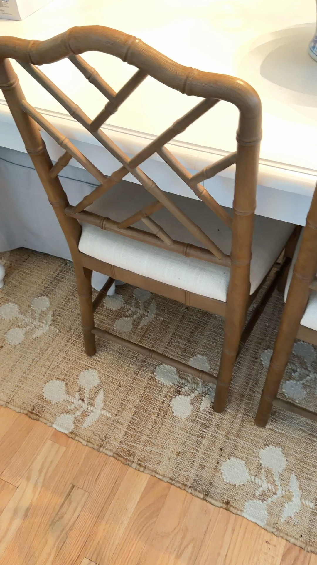 My block print jute rug is the grounding piece in my dining room, adding natural texture and classic coastal style to the space. I love how the blue and white pattern pairs perfectly with crisp white furniture for a layered, designer-inspired coastal look. @Wayfair