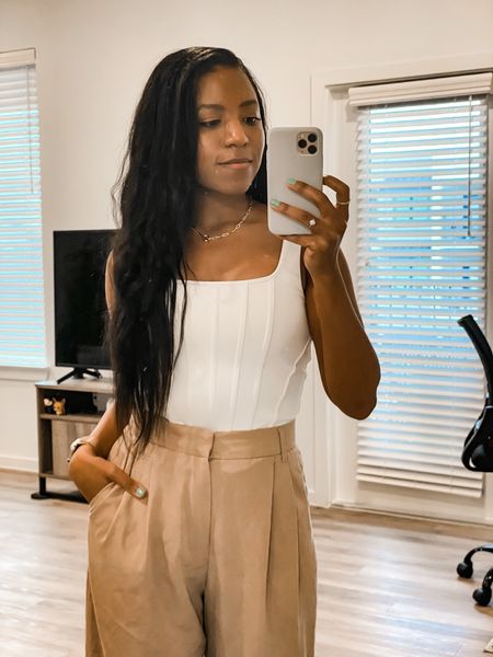 Wardrobe essentials like a neutral tank and wide leg trousers make for great office style. Read the blog for the latest post all about the 9 style essentials every fashion girl needs  

#LTKstyletip #LTKworkwear