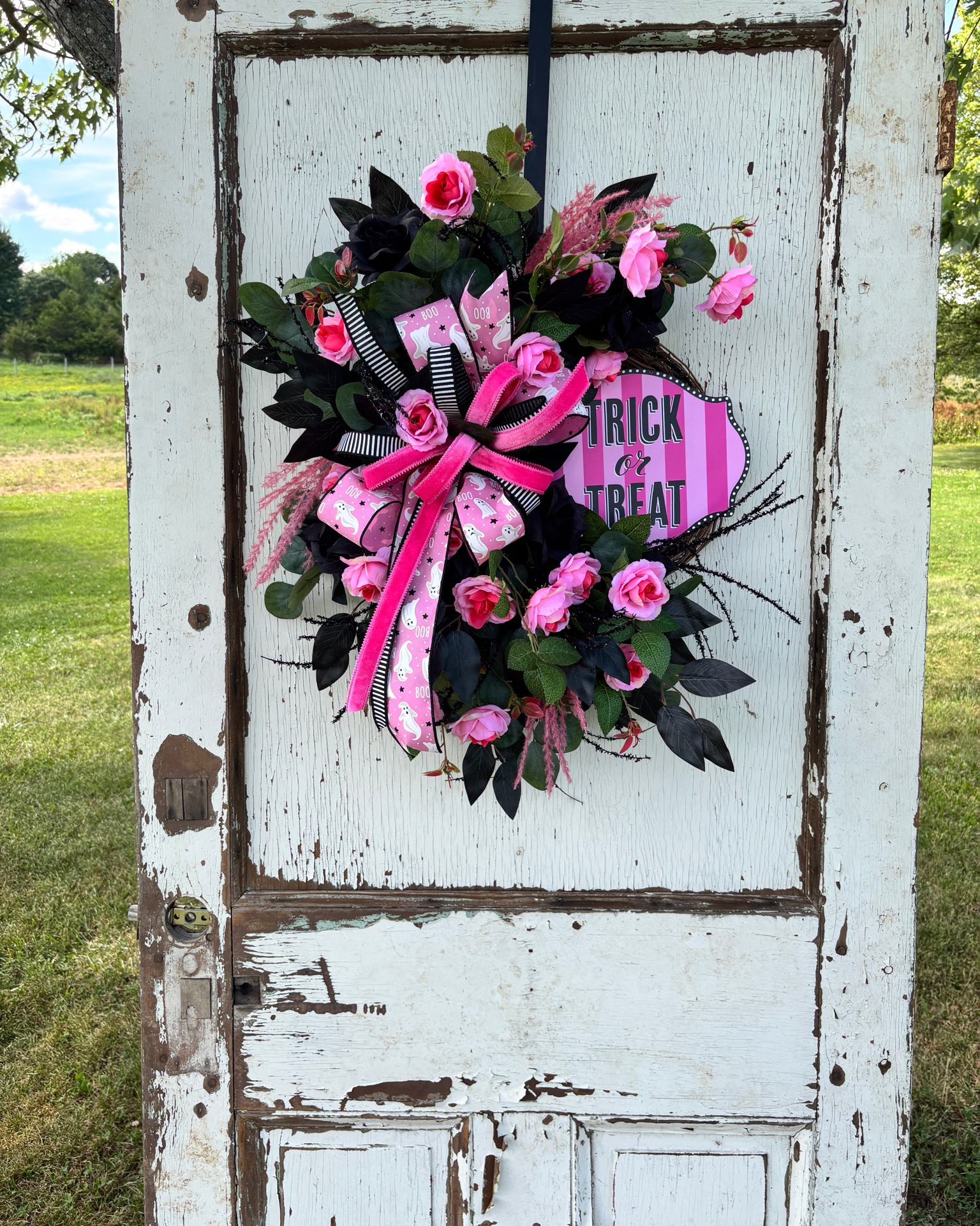 🎃💖 Not all Summerween wreaths are created equal! 💖🎃

If you love a little spooky mixed with bright, bold summer colors, this one is for you! Featuring vibrant pink roses, dramatic black accents, playful ghost ribbon, and a fun Trick or Treat sign, this design is the perfect way to celebrate Summerween in style.

Handcrafted with attention to every detail, this wreath is sure to make your front door the talk of the neighborhood all season long.

#LTKHome #LTKSeasonal #LTKU