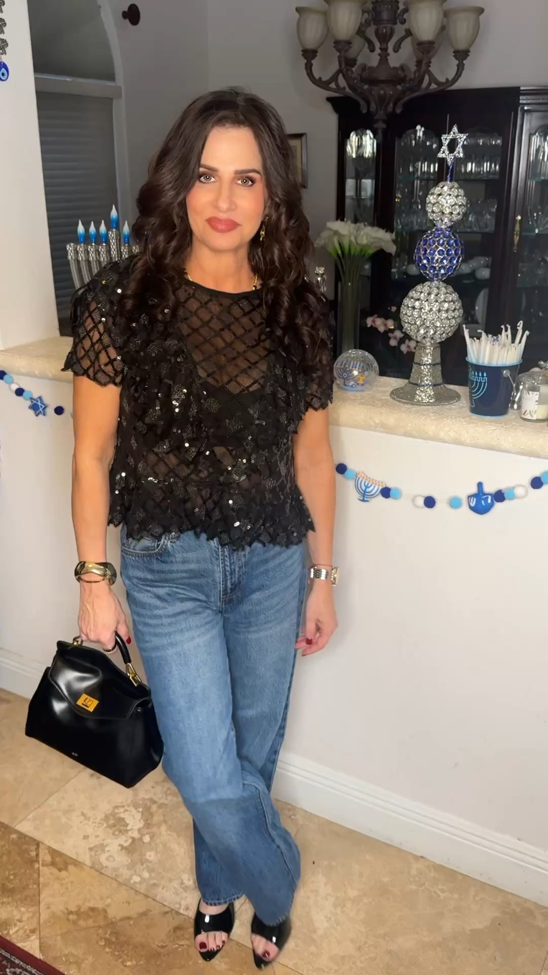 Sequin top , so pretty - perfect for the holiday season . Wearing a sm , jeans 25 . The top is sheer so I sm wearing a cami . #gno #sequintop #festivestyle 

#LTKgno

#LTKSeasonal #LTKOver40 #LTKHoliday