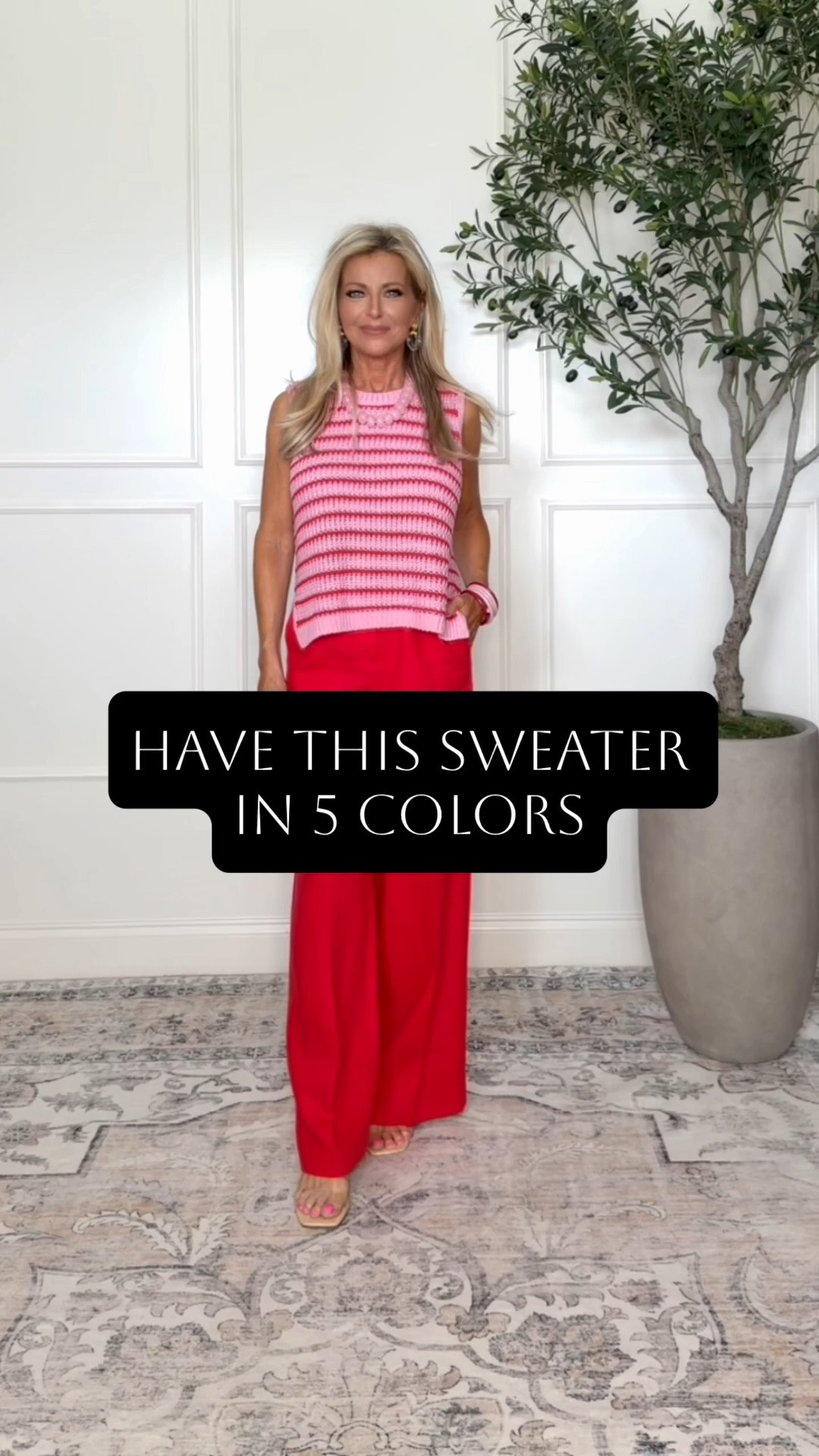 Love this striped sleeveless sweater.