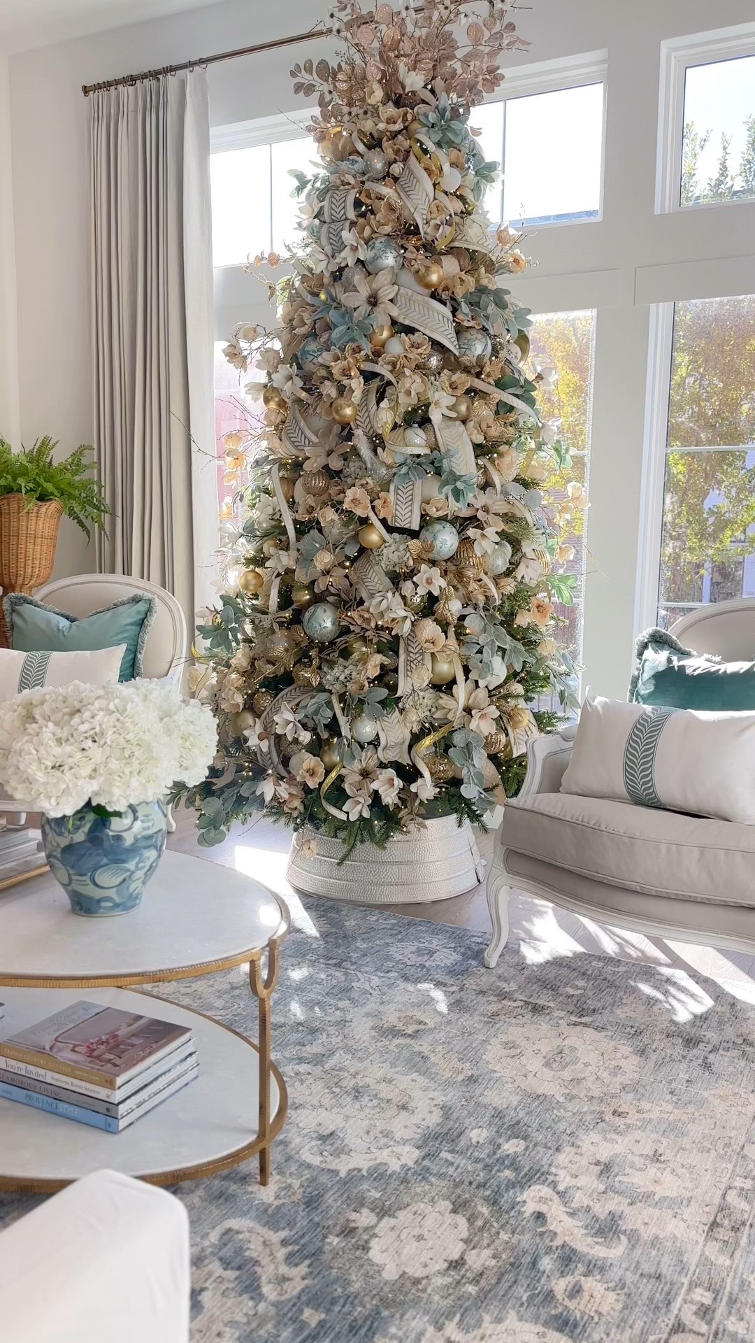 A winter garden in bloom 🌸🍃🕊️✨ affordable 9ft twinkle tree under $450! 🎄✨ Christmas decor floral Christmas tree not a Ralph Lauren Christmas 

#LTKFindsUnder50 #LTKHome #LTKSaleAlert