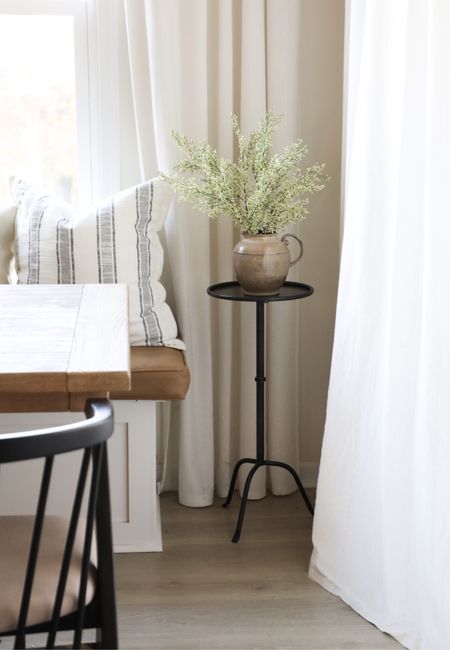 I love the lines on this table paired with these affordable florals for spring! 🥰 I used two stems in this photo. #ltkhome #homedecor #amazondecor #springflorals #homedecorating #diningroom #livingroom 

#LTKhome