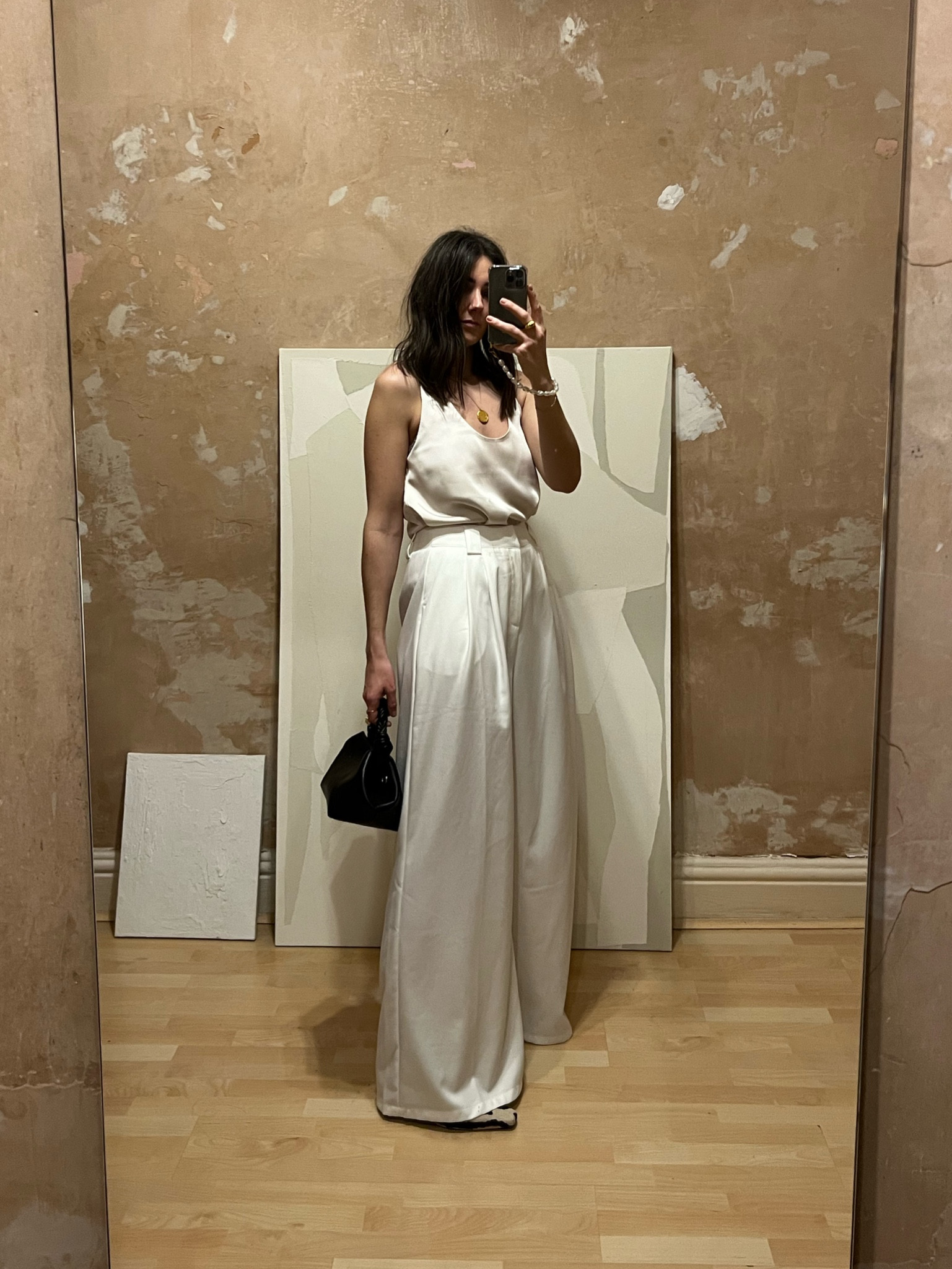 An all neutral outfit which would make a great NYE or any other occasion look: wide leg trousers, satin tank top, cute bag and zebra print boots to add some fun!

I also bought the top in black because it’s £4! And I know I’ll wear it a lot. 

Sizing info:
S in the top
12 in the trousers
Small bag
Boots are true to size 

#LTKworkwear #LTKSeasonal #LTKstyletip