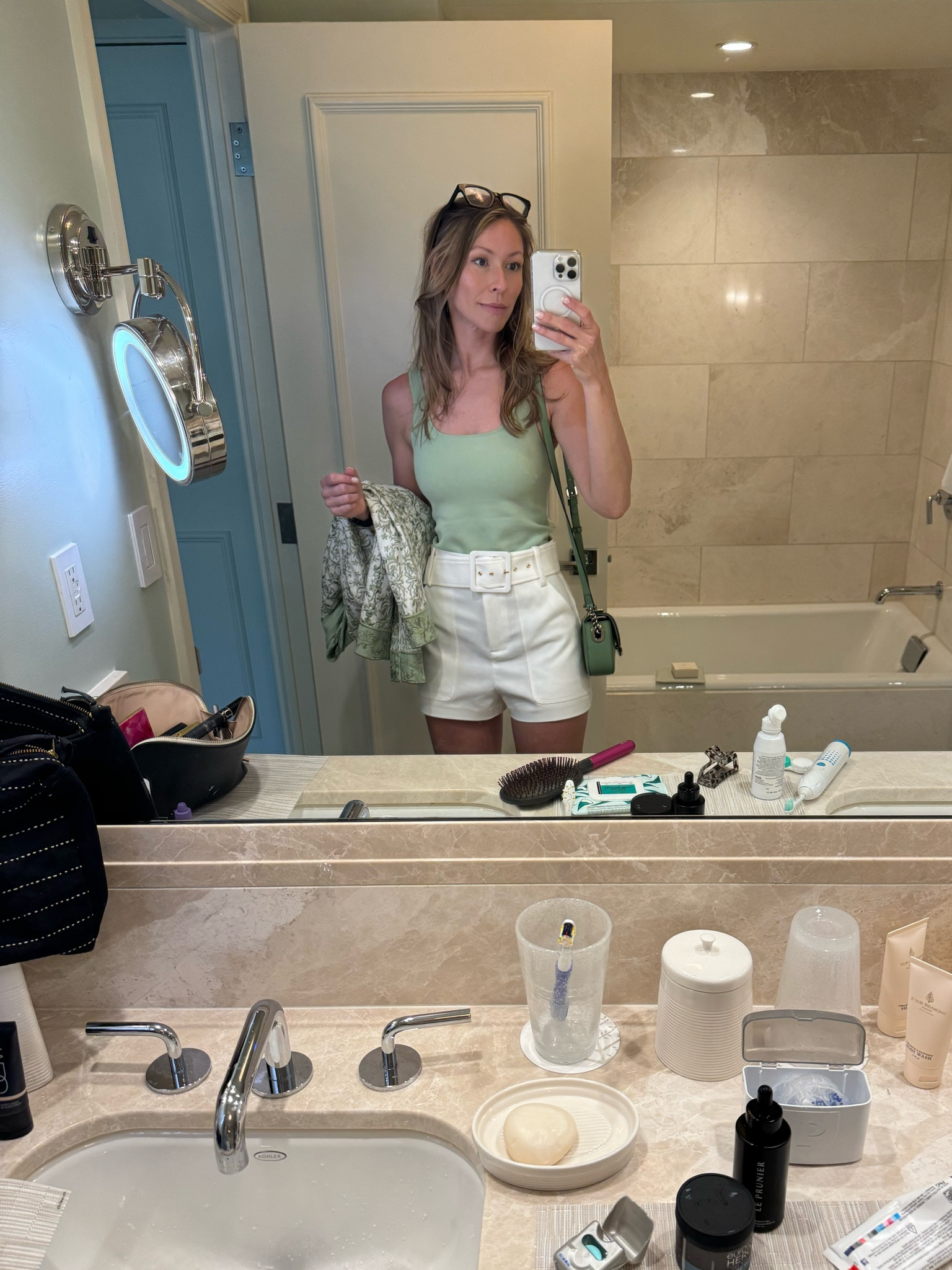 Obligatory bathroom shot! I felt very Palm Beachy in this outfit 💕

The Ramy Brook shorts are linked below but the white color are sold out. I also linked similar green purses! 



#LTKworkwear #LTKparties #LTKtravel