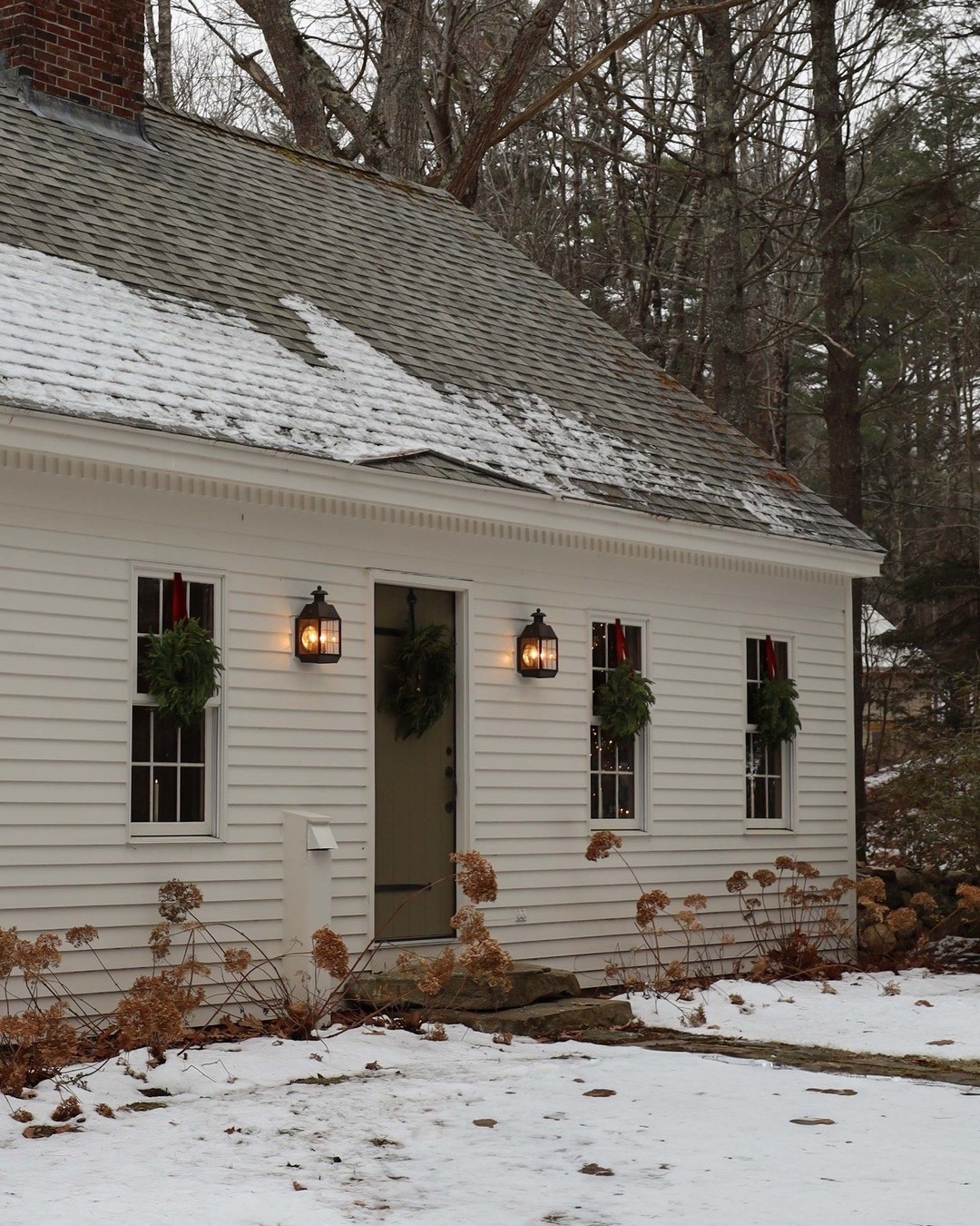 Our Christmas Cape Cod
.
Faux wreaths with ribbon | bronze outdoor sconces

#LTKHoliday #LTKHome
