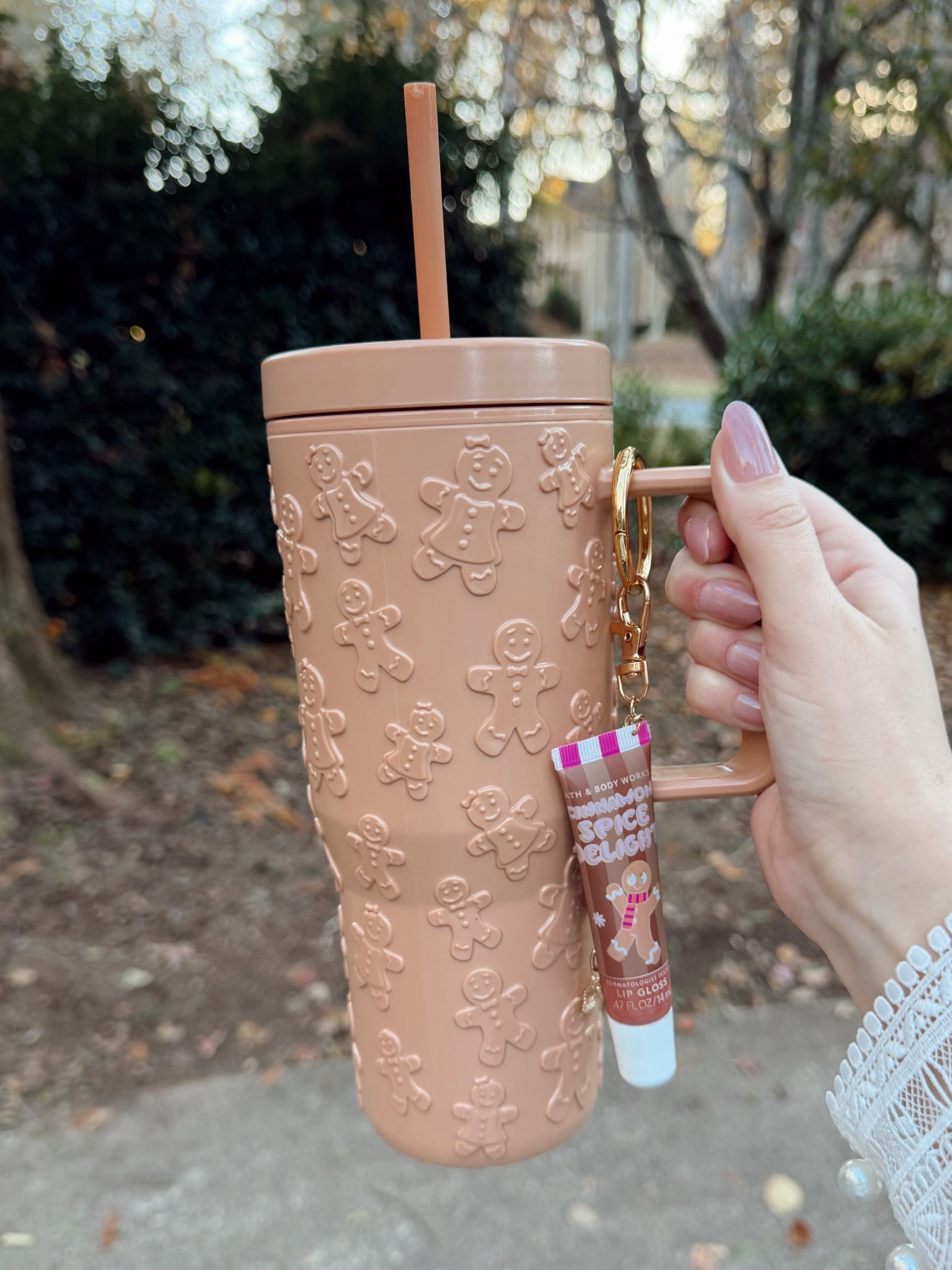 My favorite Christmas cup right now
Ginger bread tumbler from Walmart and I made a cute lipgloss charm with a lot from Amazon and bath and body works Christmas lip gloss 

#LTKGiftGuide #LTKCyberWeek #LTKHoliday